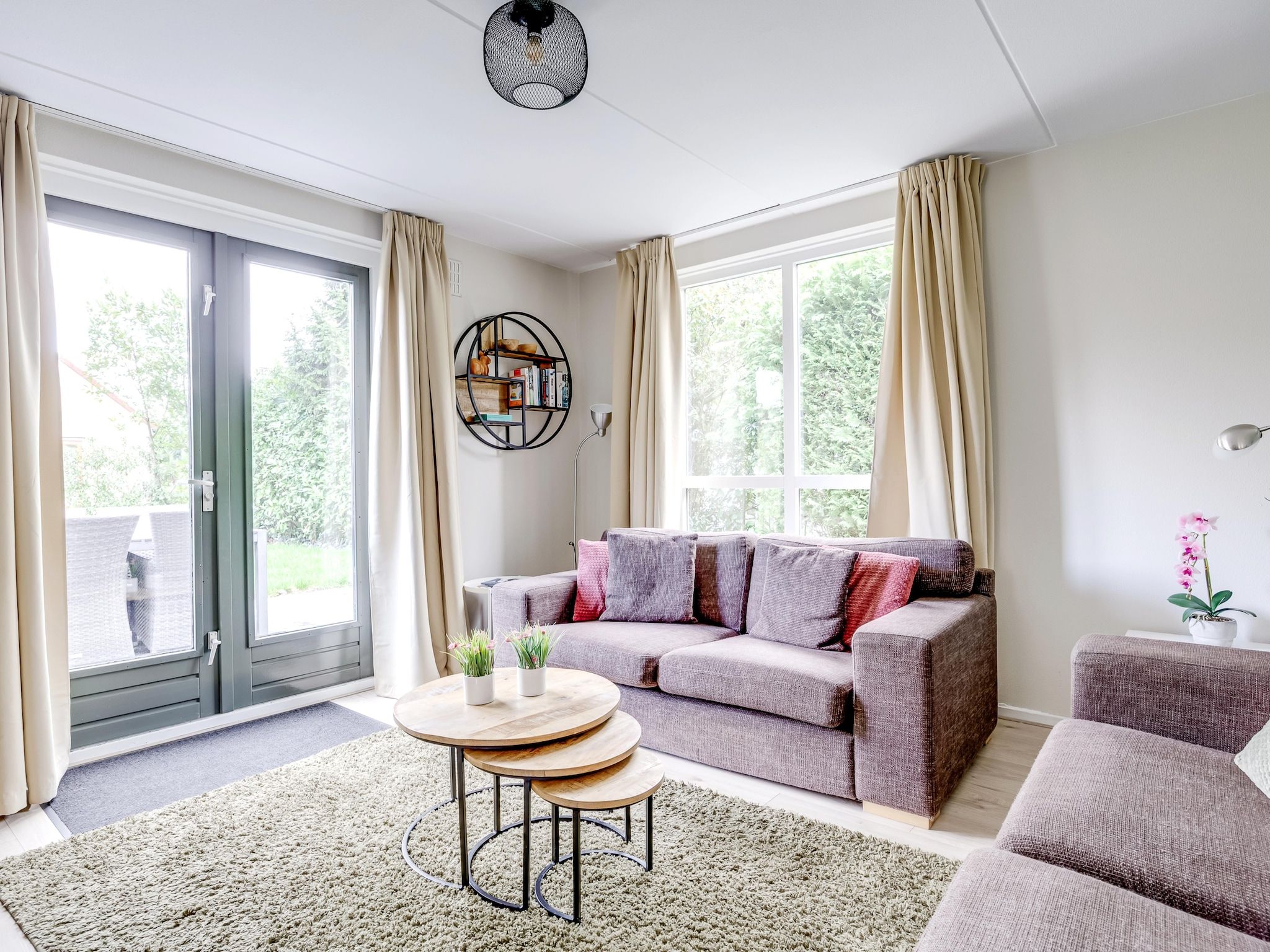 De woonkamer van 7 - Persoons Forest 217 Sauna Bungalow (copy) (copy) (copy) (copy) in Ewijk