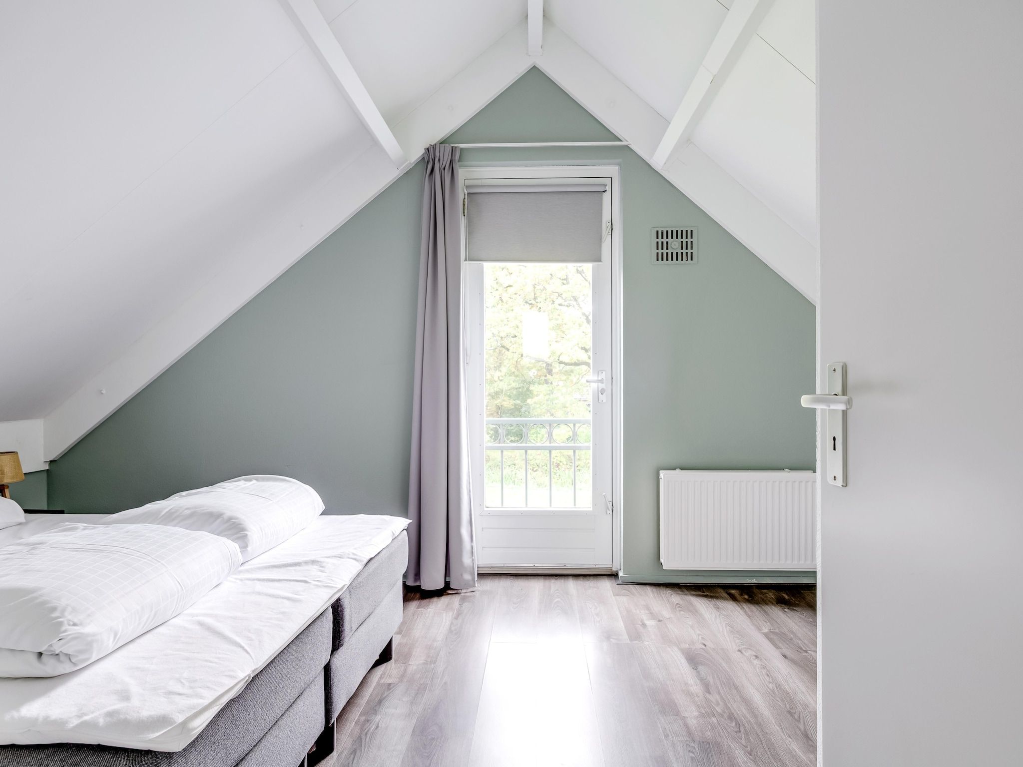 Een slaapkamer van 7 - Persoons Forest 217 Sauna Bungalow (copy) (copy) (copy) (copy) in Ewijk