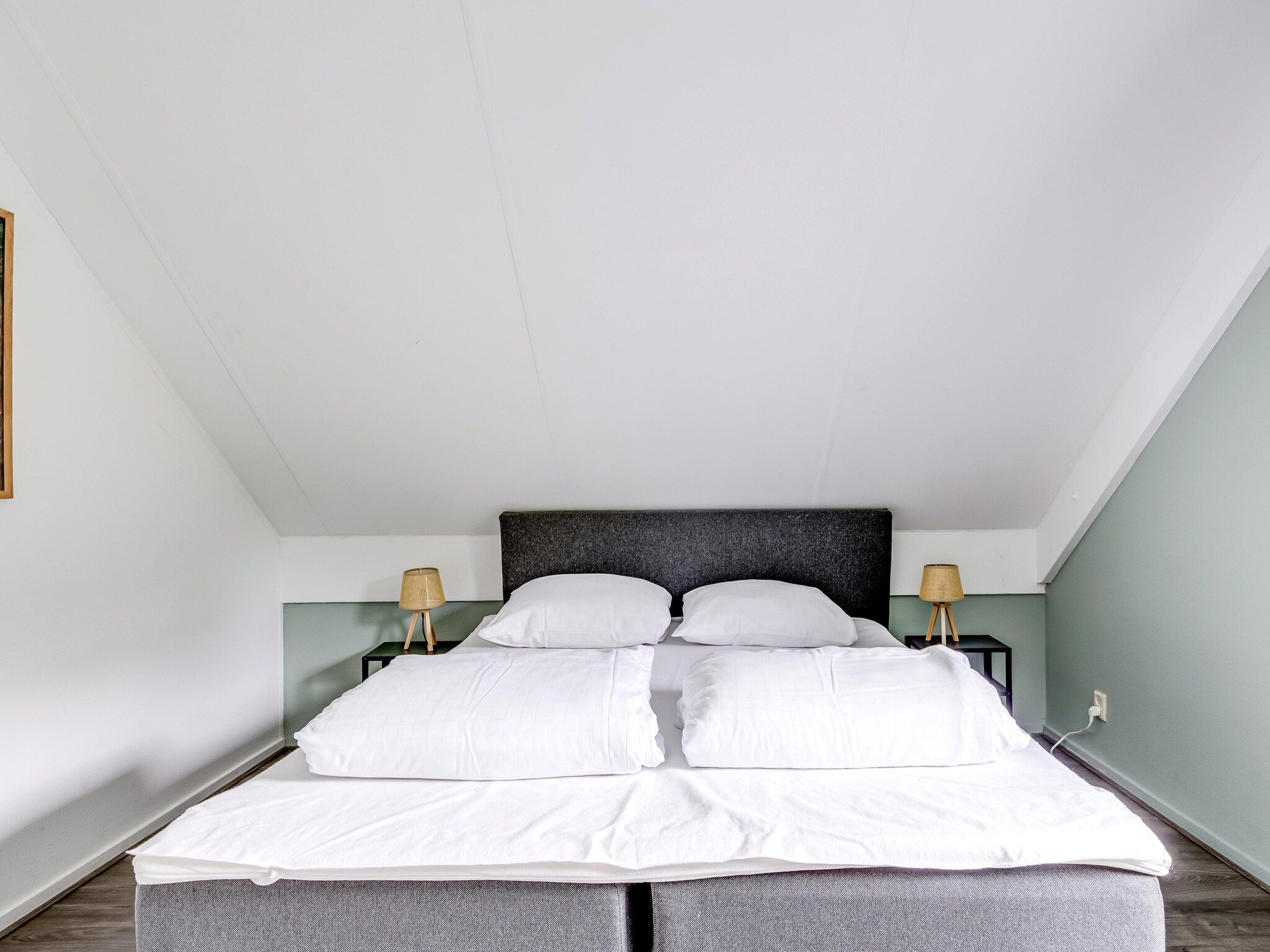 Een slaapkamer van 7 - Persoons Forest 217 Sauna Bungalow (copy) (copy) (copy) (copy) in Ewijk