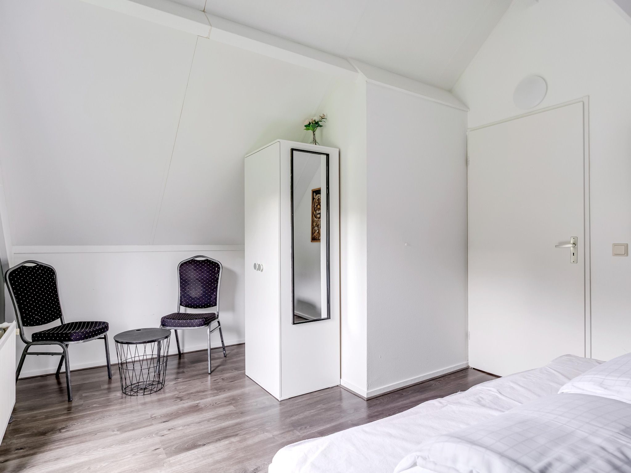 Een slaapkamer van 7 - Persoons Forest 217 Sauna Bungalow (copy) (copy) (copy) (copy) in Ewijk