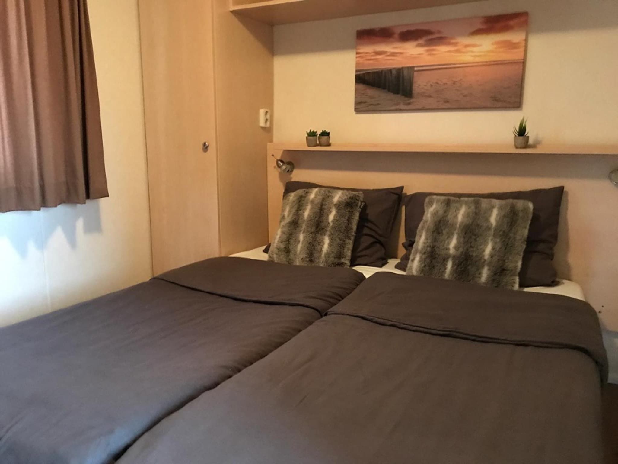 Een slaapkamer van Duinchalet Ameland in Hollum