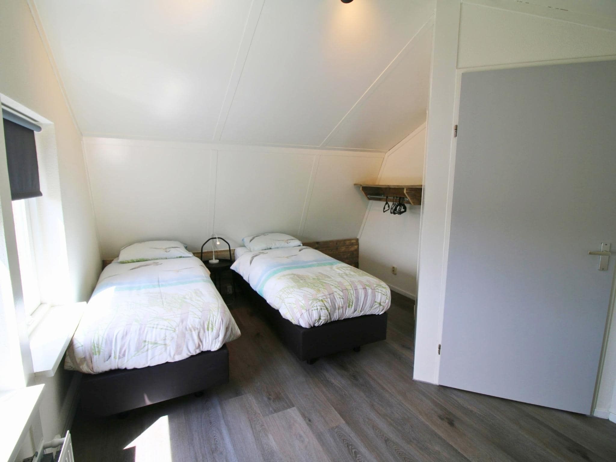 Een slaapkamer van Bungalow 4-persoons (2 slaapkamers) in Noordwijk