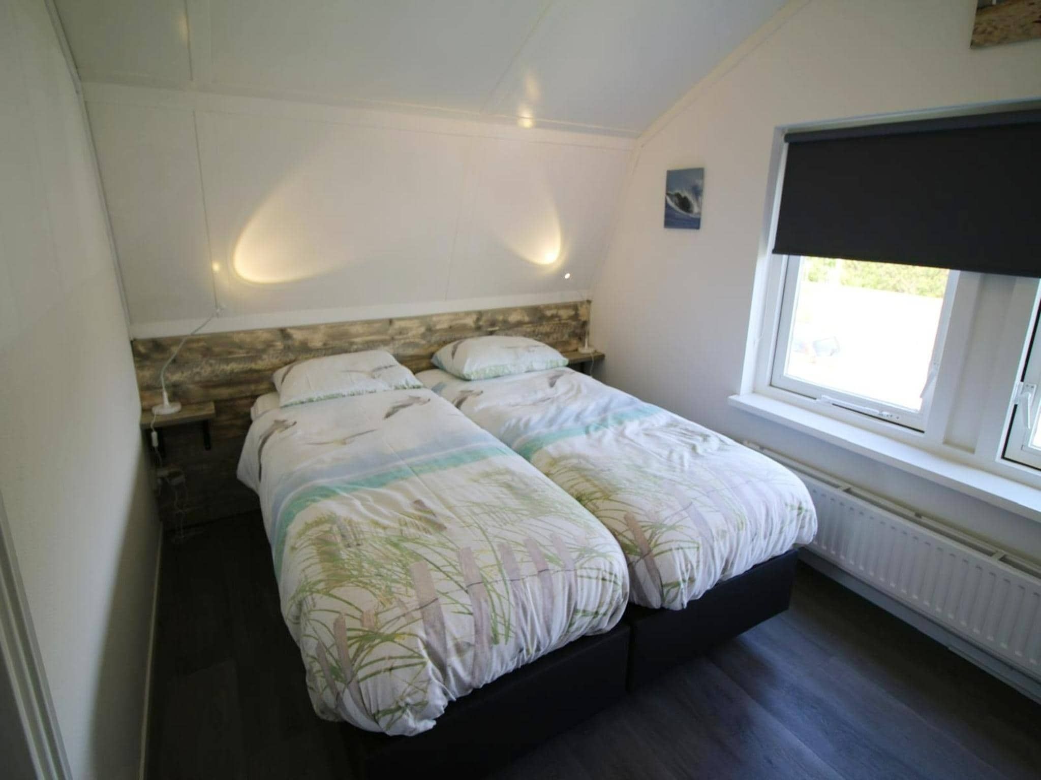 Een slaapkamer van Bungalow 4-persoons (2 slaapkamers) in Noordwijk