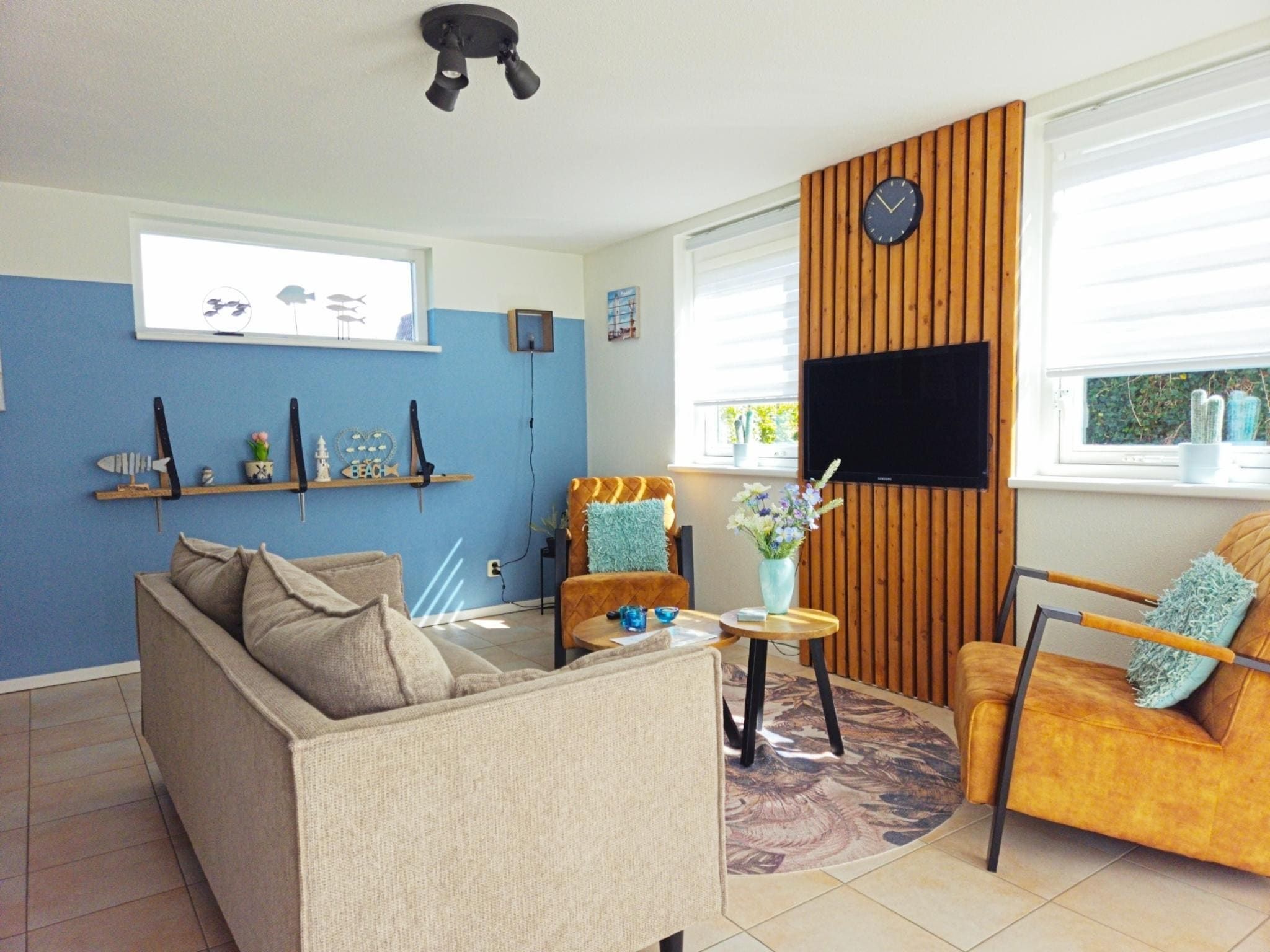 De woonkamer van Bungalow 4-persoons Huisdiervrij in Noordwijk