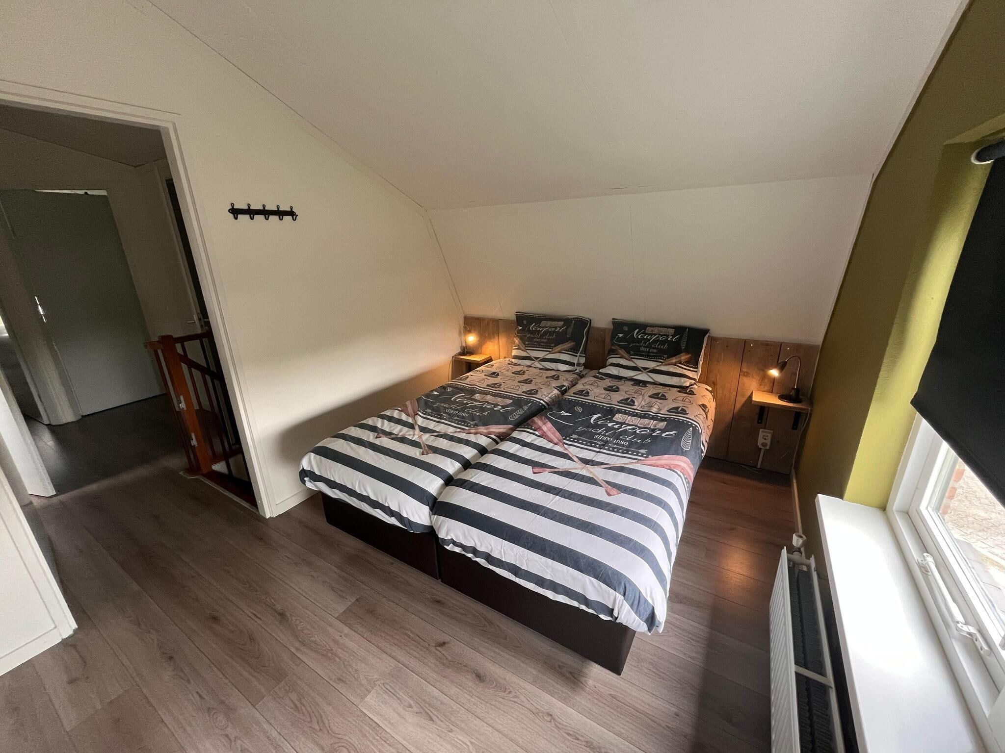 Een slaapkamer van Bungalow 5-persoons in Noordwijk