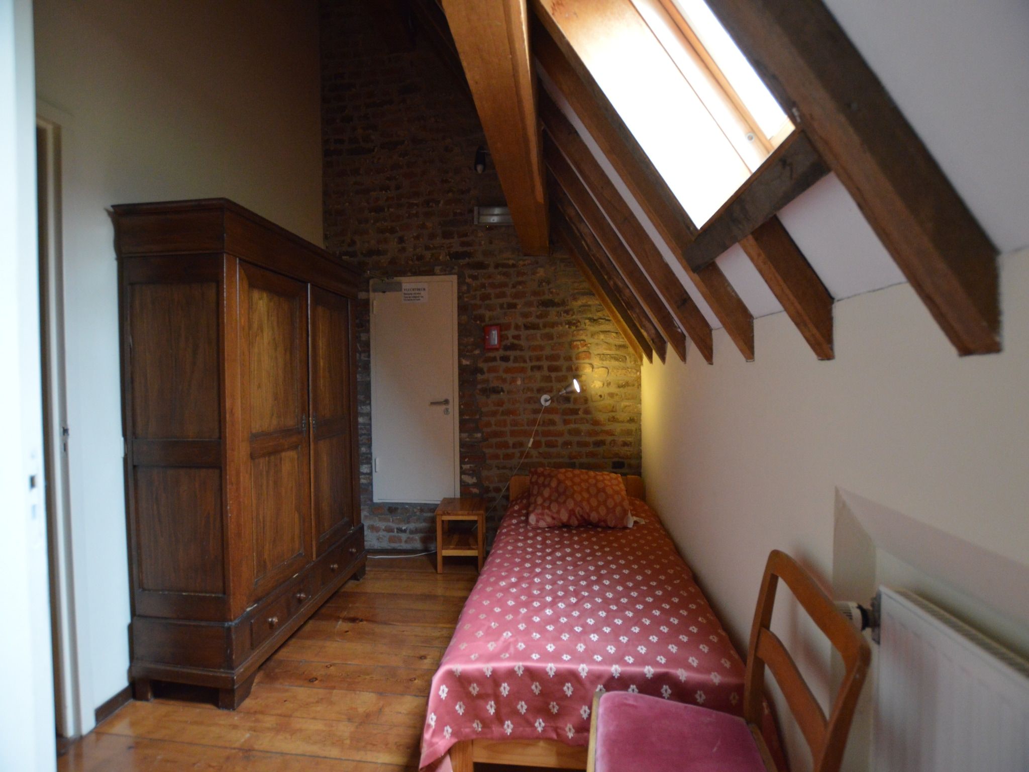 Een slaapkamer van Meschermolen 13 in Mesch-Eijsden