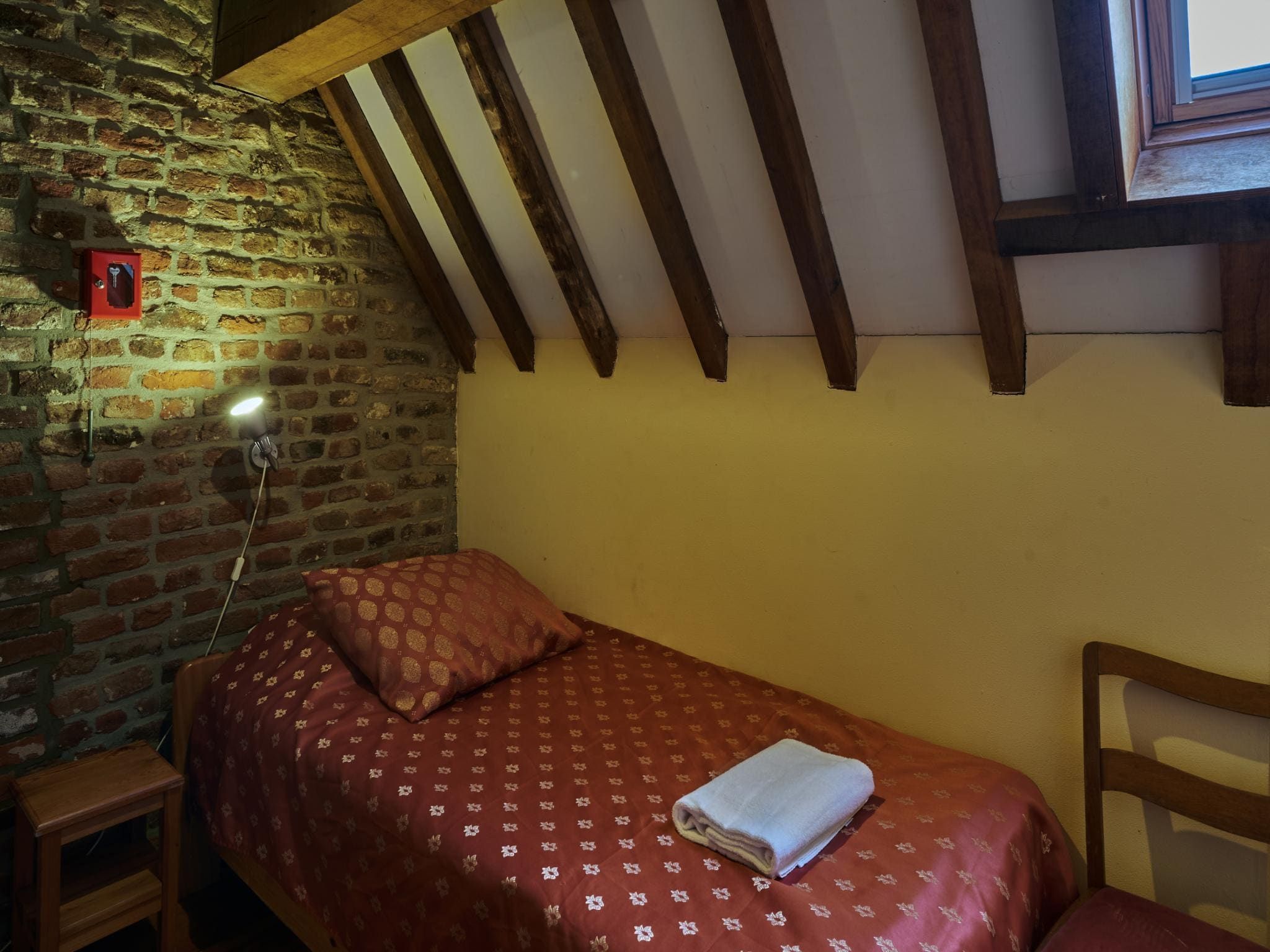 Een slaapkamer van Meschermolen 13 in Mesch-Eijsden