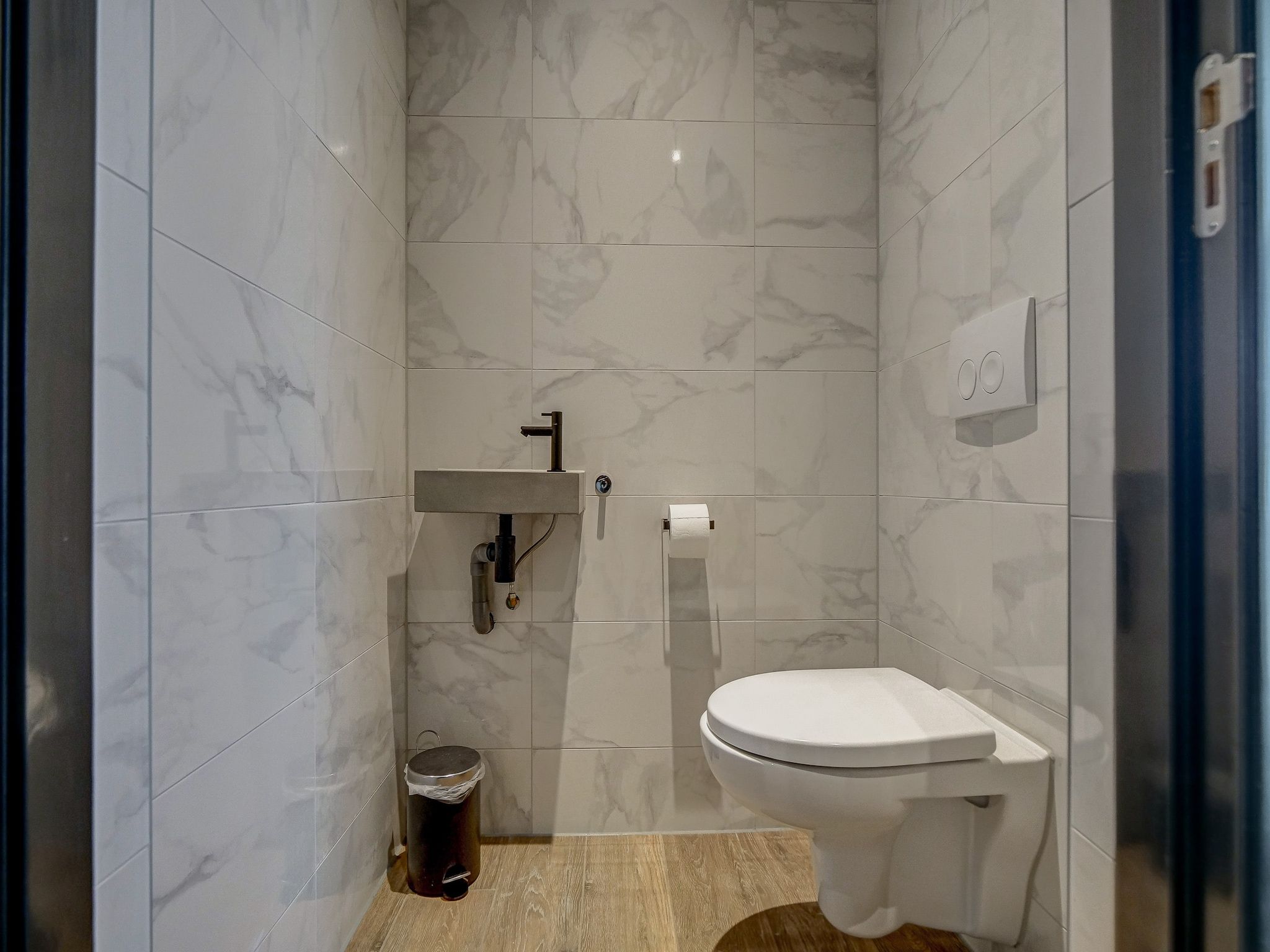 De badkamer van Familiehuis Zee & Zand in Julianadorp