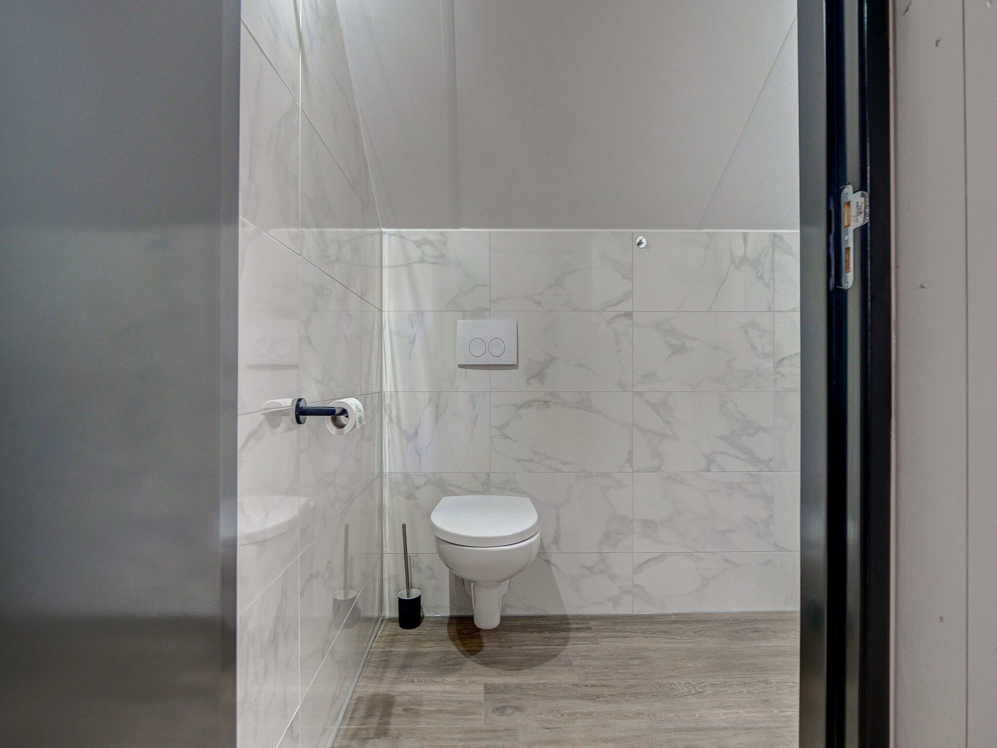 De badkamer van Familiehuis Zee & Zand in Julianadorp