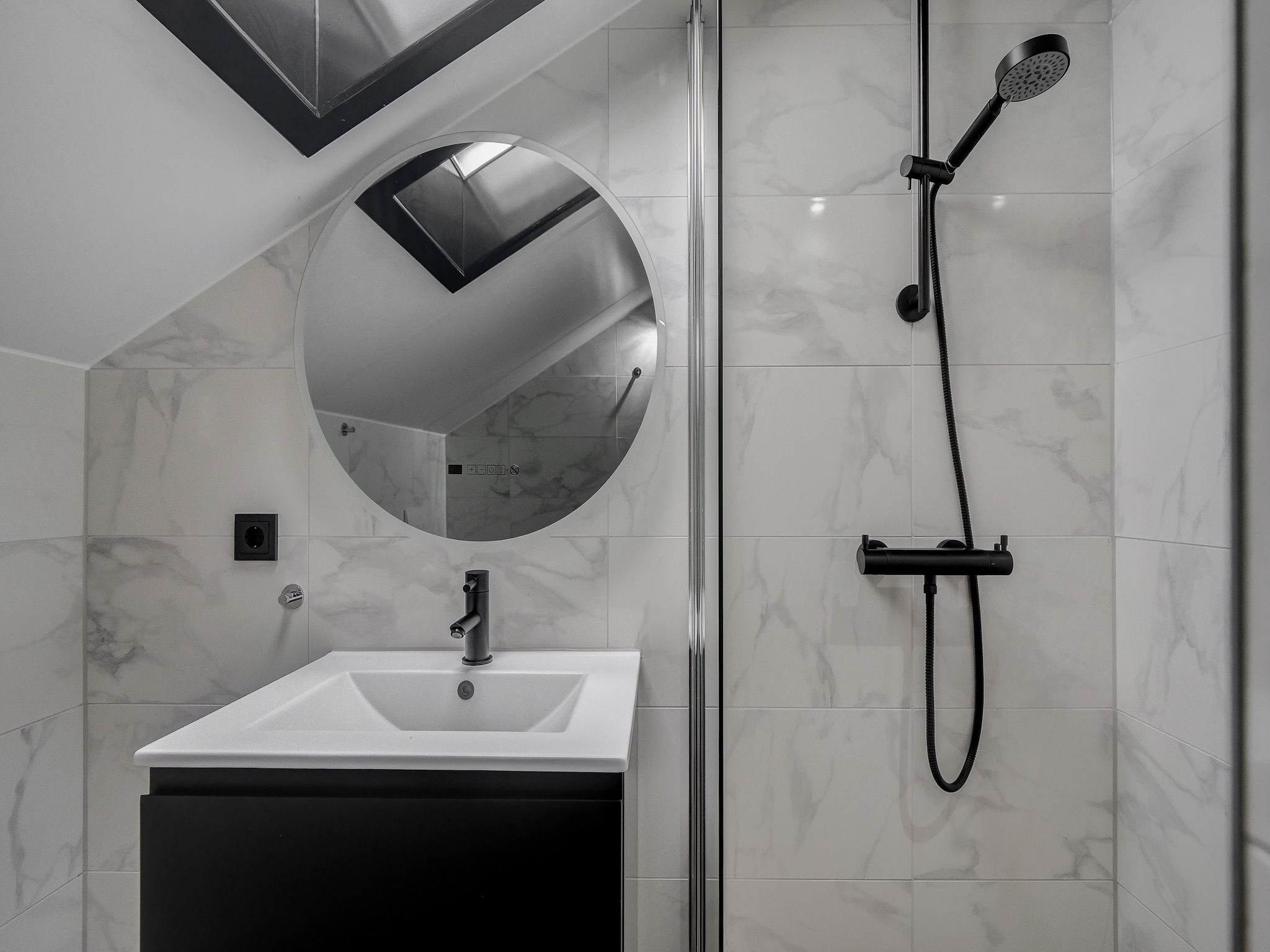 De badkamer van Familiehuis Zee & Zand in Julianadorp