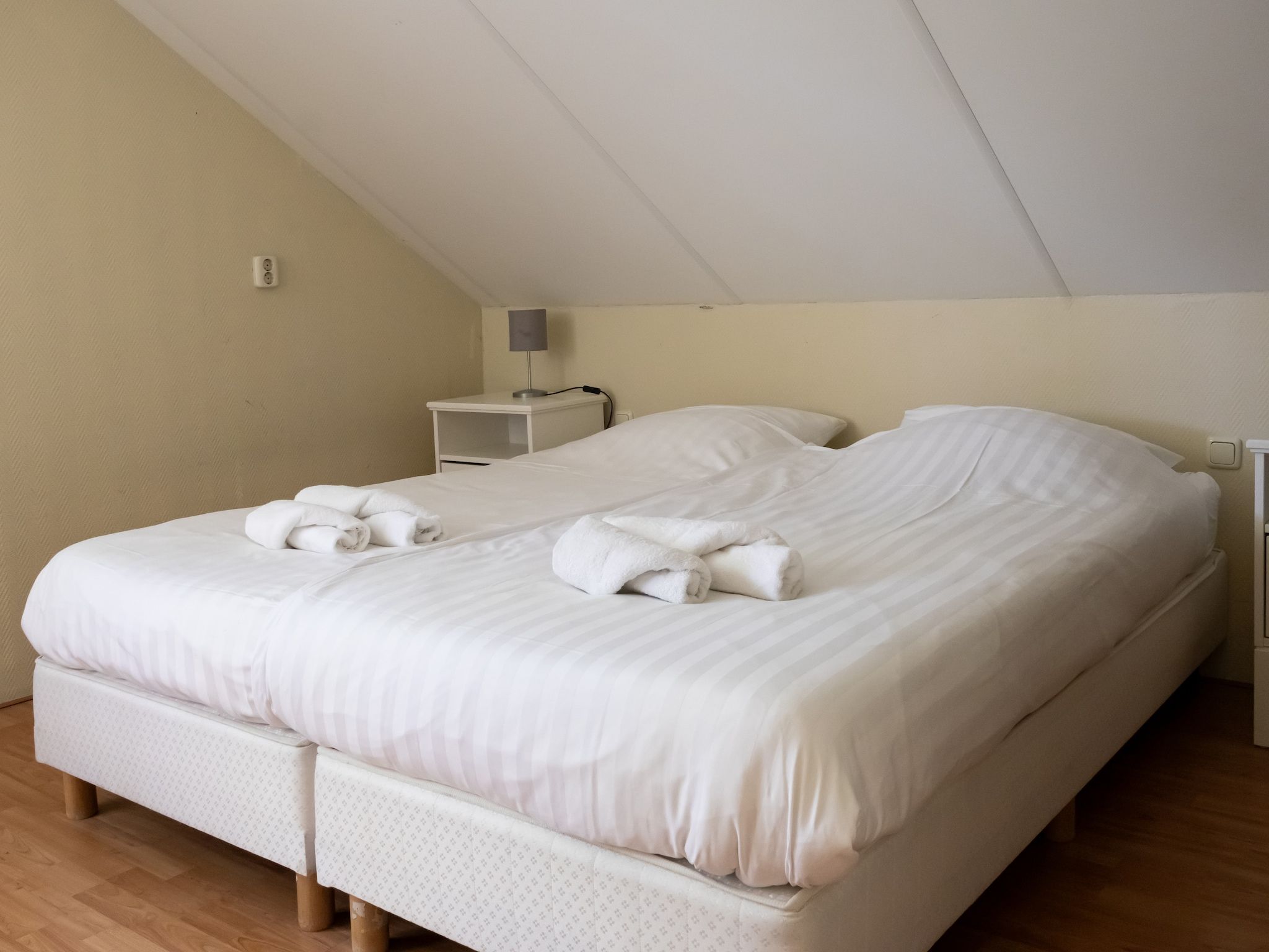 Een slaapkamer van Huis in de Bossen in Een