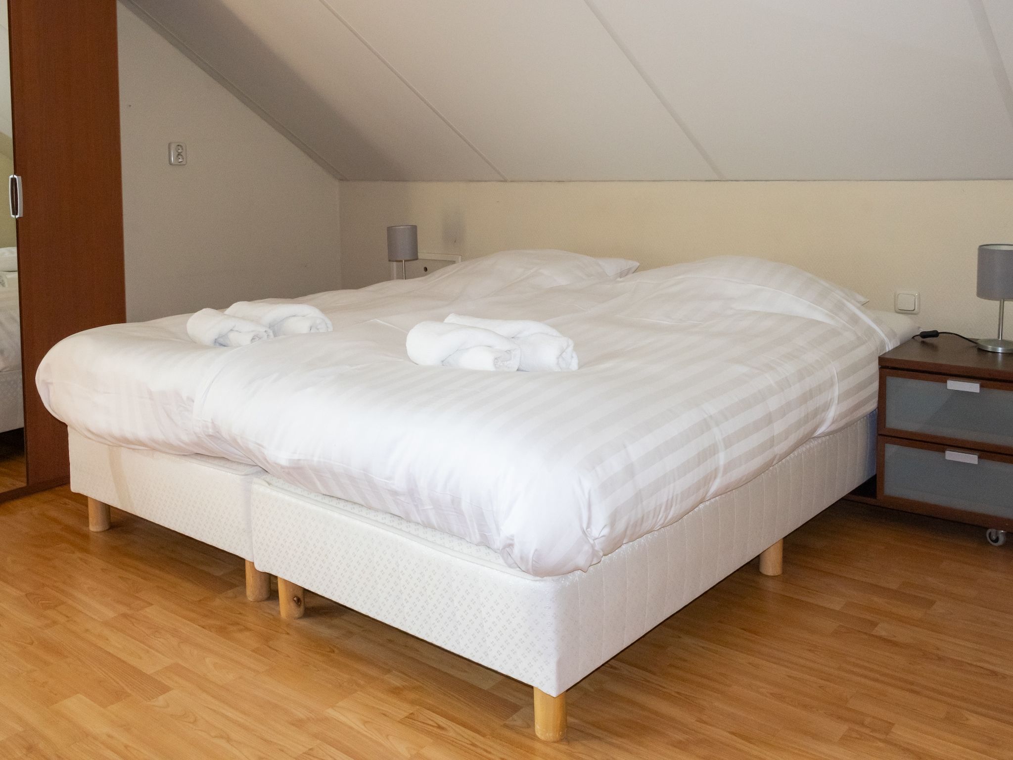 Een slaapkamer van Huis in de Bossen in Een