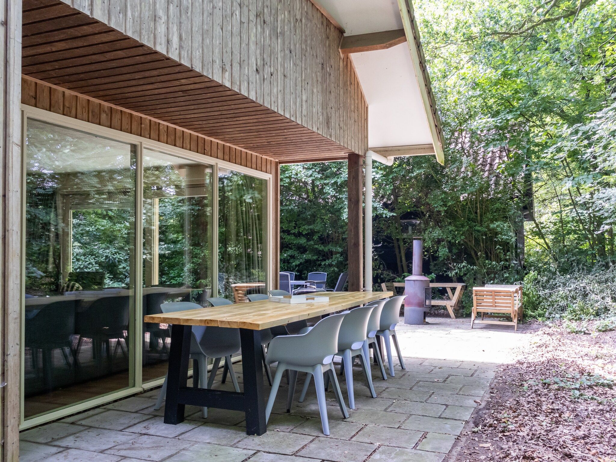 De tuin van Huis in de Bossen in Een