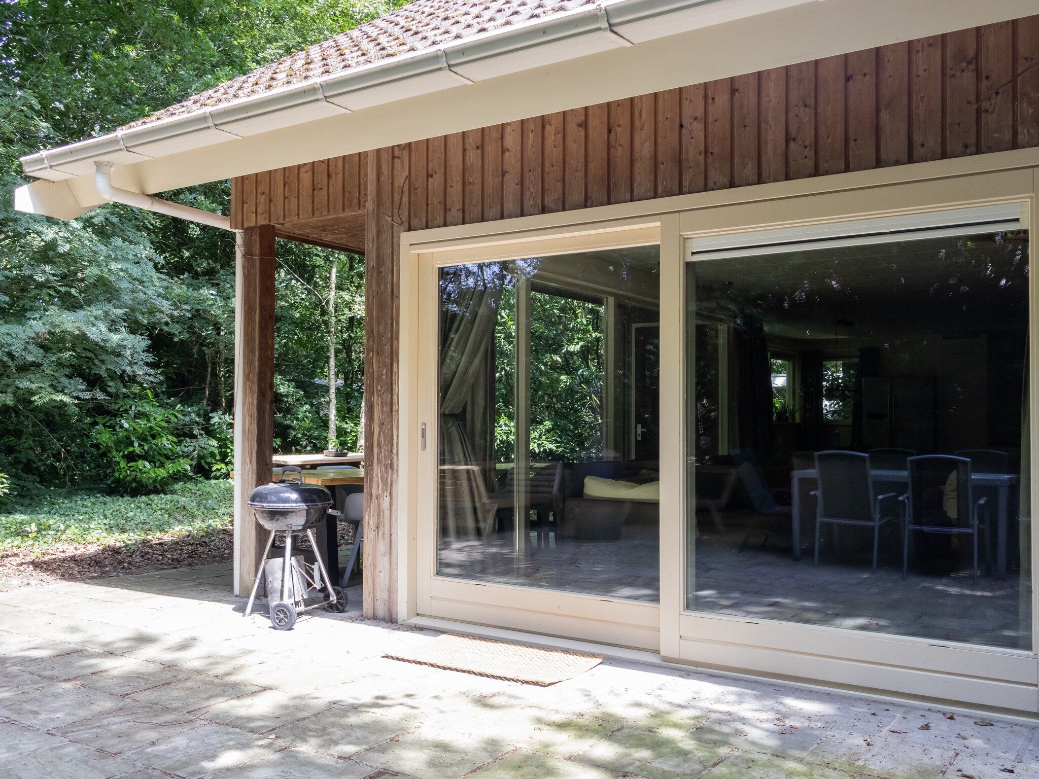 De tuin van Huis in de Bossen in Een