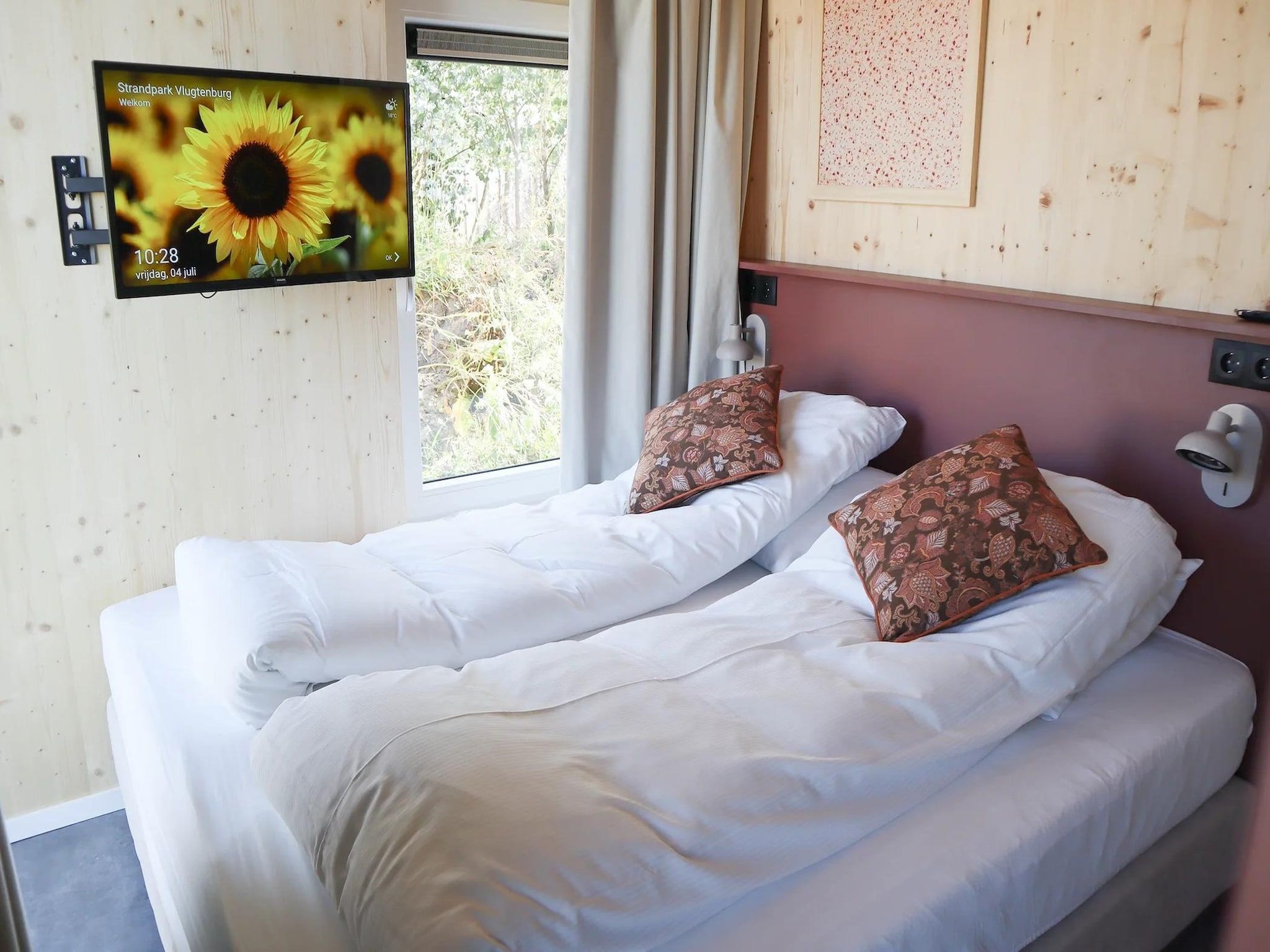 Een slaapkamer van Bungalow Ocean Deluxe 6 Person in ’s-Gravenzande