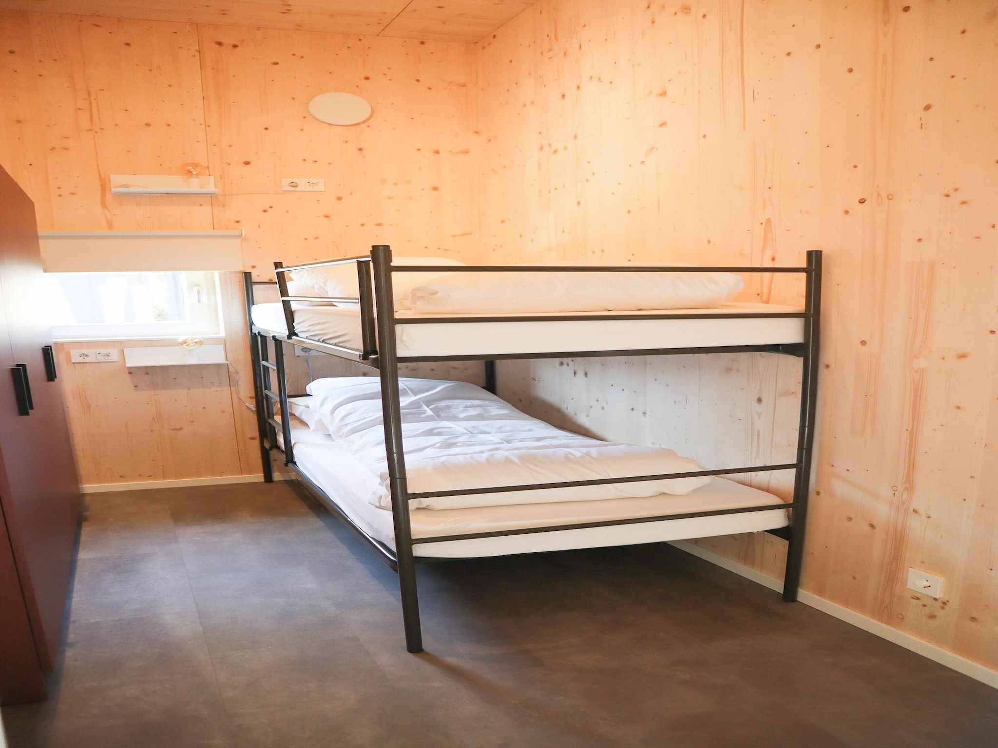 Een slaapkamer van Bungalow Ocean Deluxe 6 Person in ’s-Gravenzande