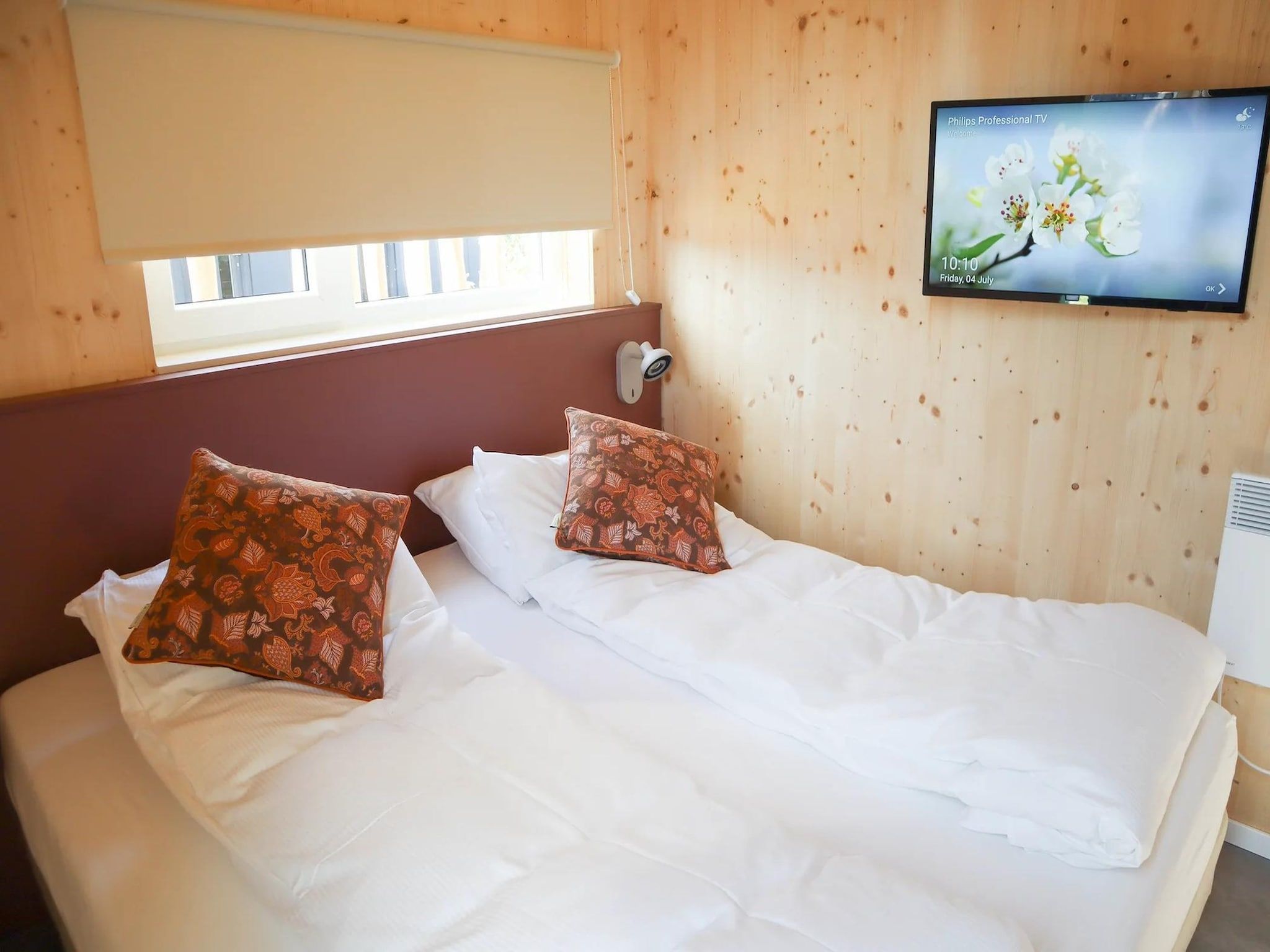 Een slaapkamer van Bungalow Ocean Deluxe 6 Person in ’s-Gravenzande