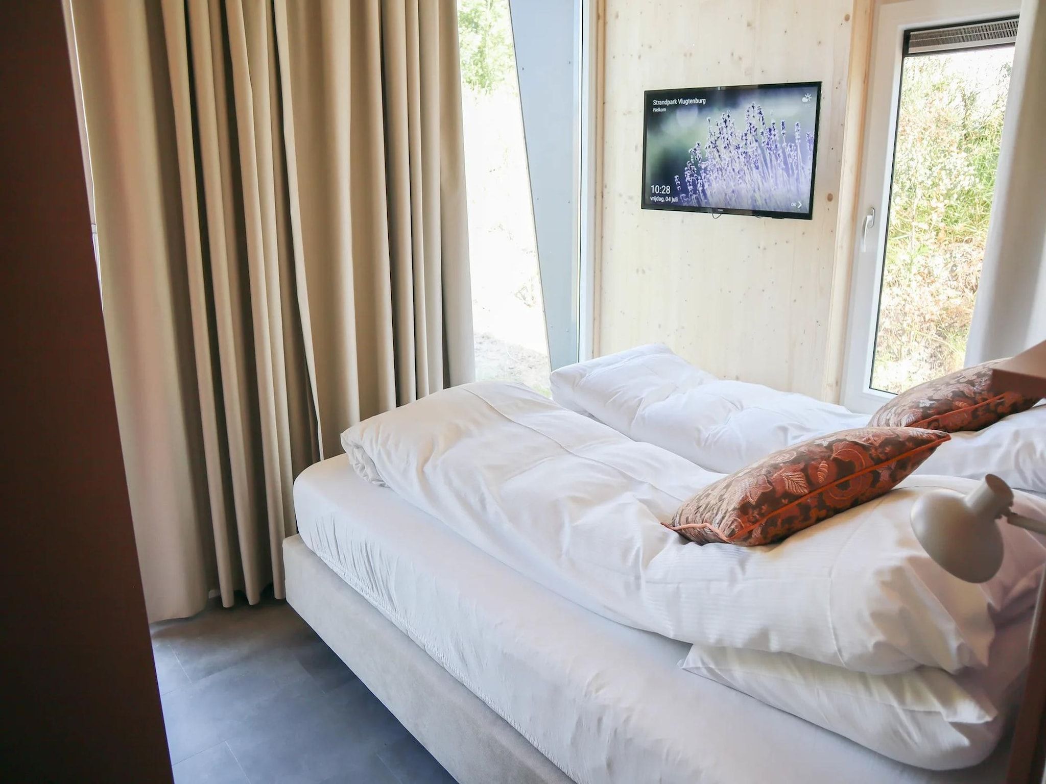 Een slaapkamer van Bungalow Ocean Deluxe 6 Person in ’s-Gravenzande