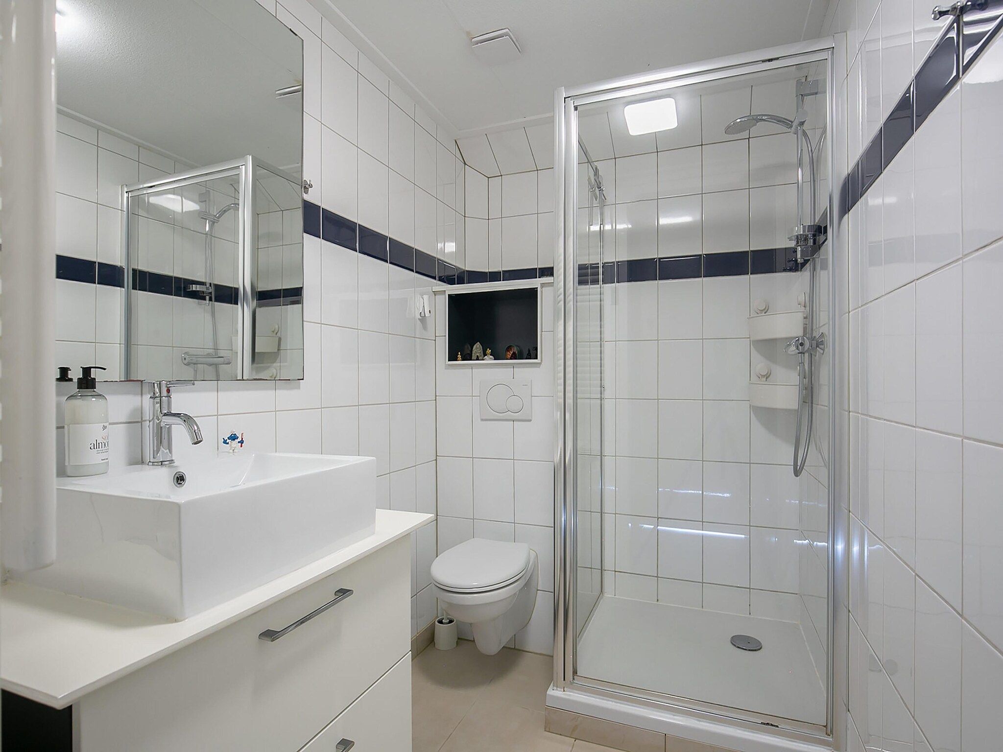 De badkamer van Combinatiewoningen Wolters in grou