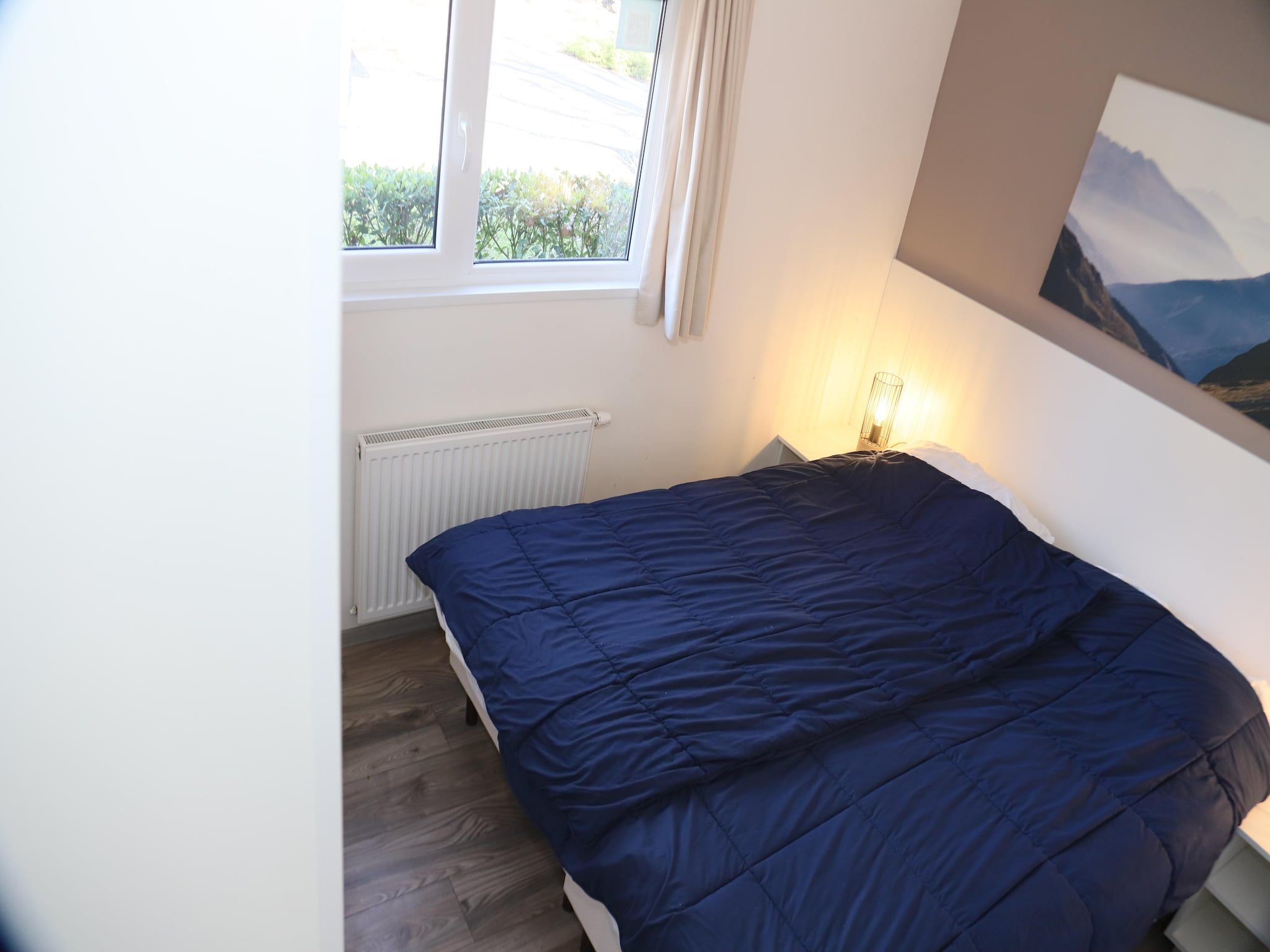 Een slaapkamer van Hackfort kavel 143 in Biddinghuizen