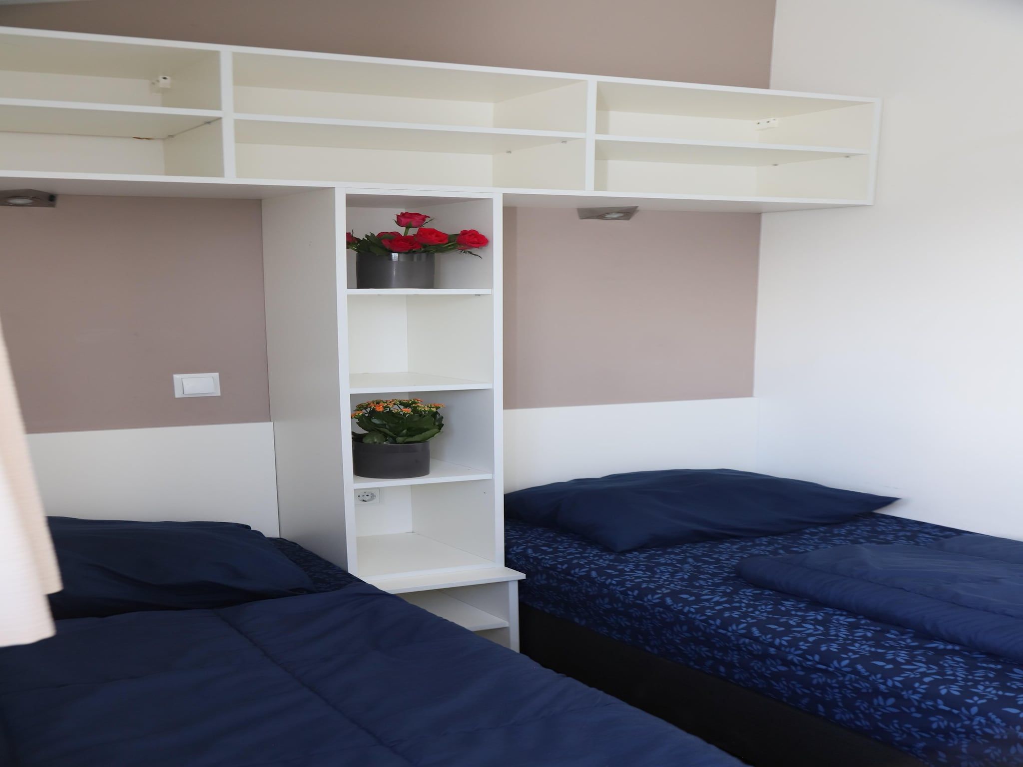 Een slaapkamer van Hackfort kavel 143 in Biddinghuizen