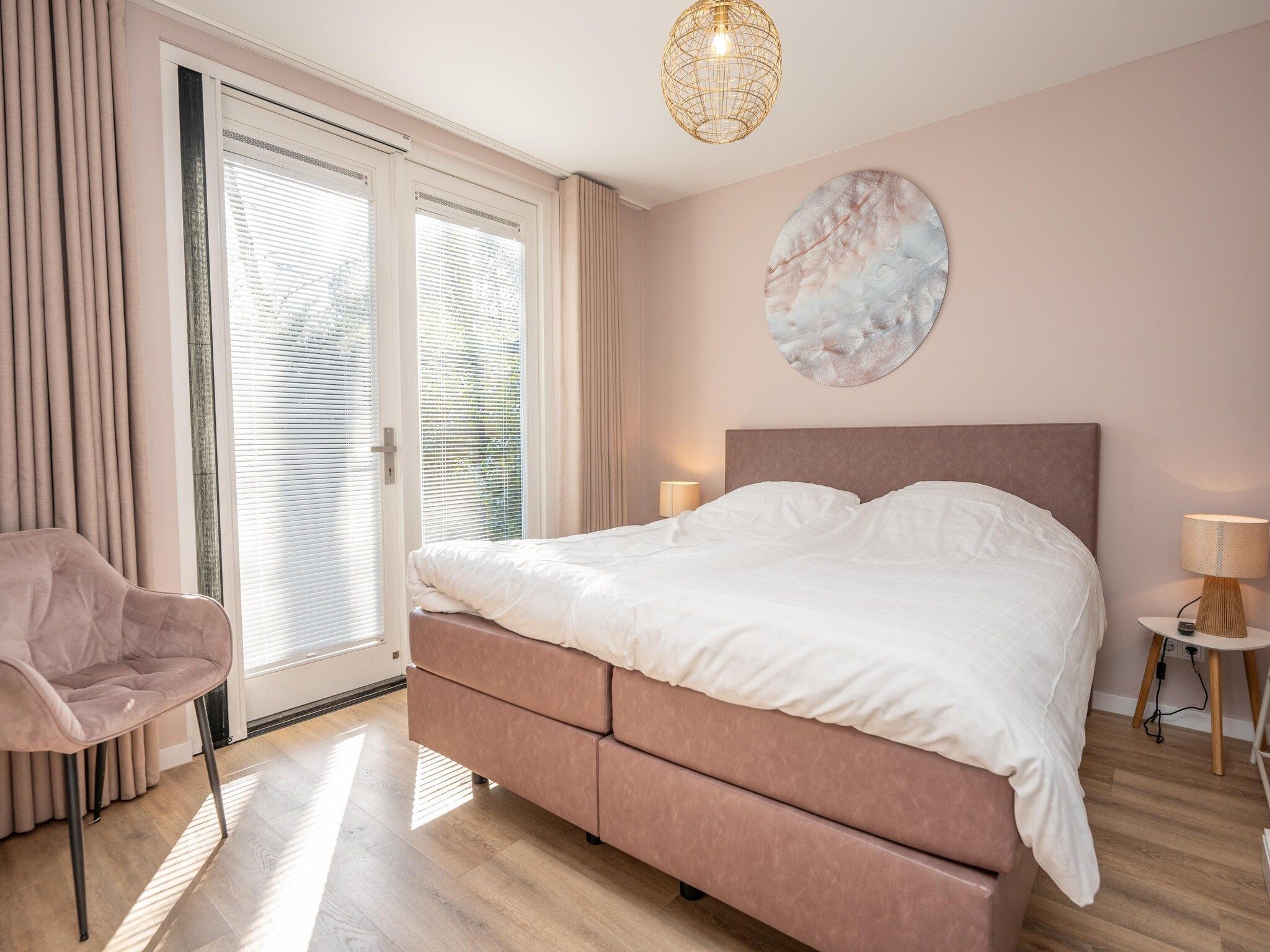 Een slaapkamer van Mienterbos-Heideglop in De Koog