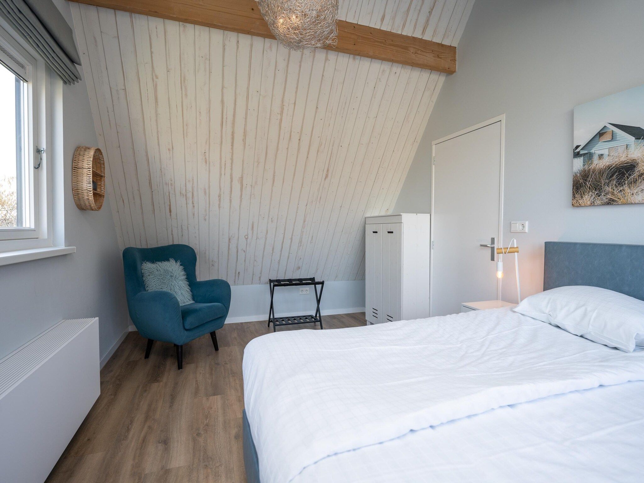 Een slaapkamer van Mienterbos-Duinglop in De Koog