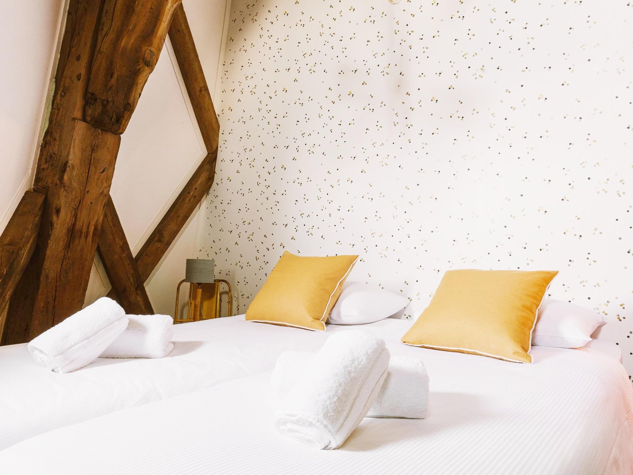 Een slaapkamer van De Molen van Egmond in Egmond aan den Hoef