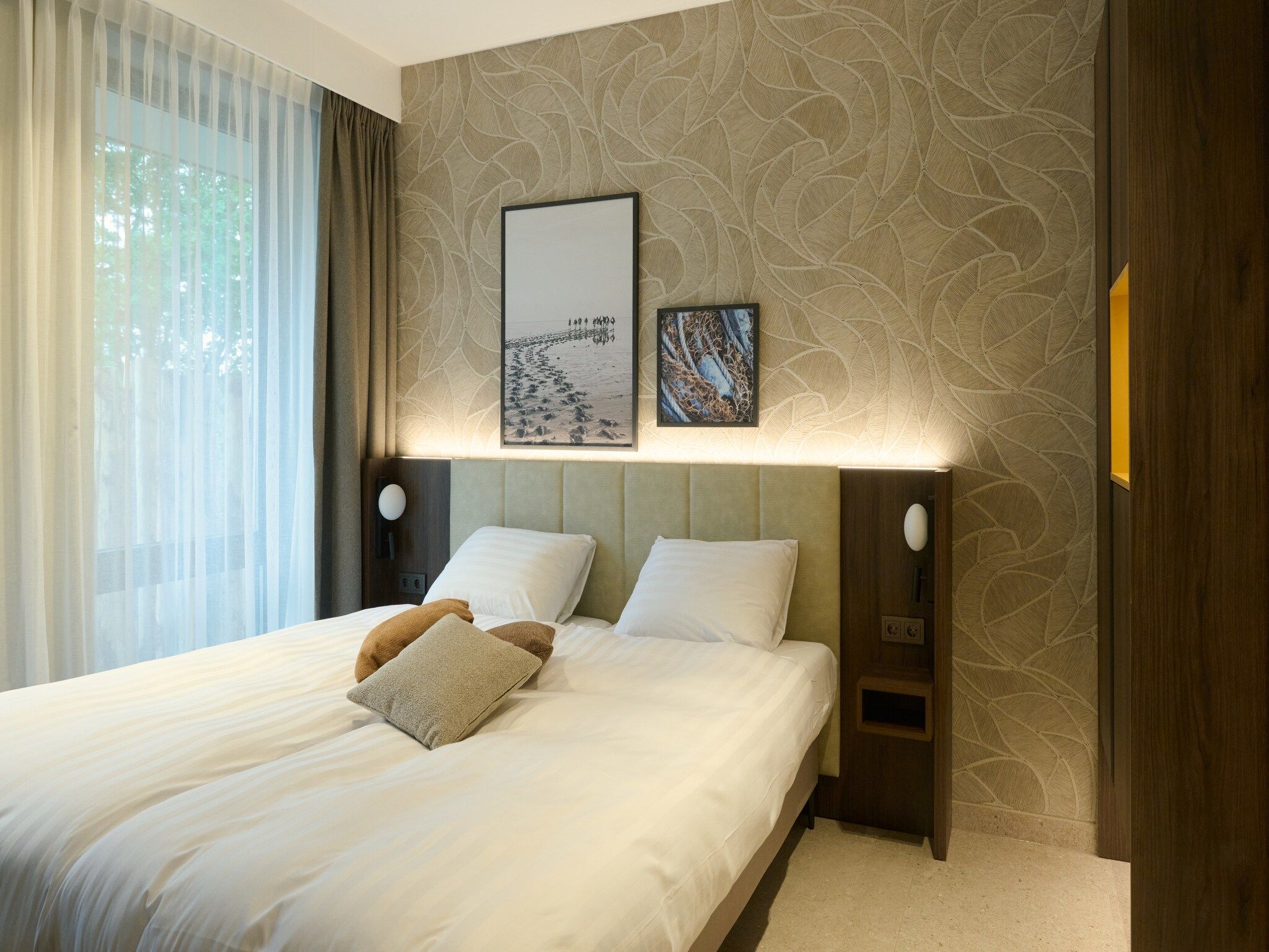 Een slaapkamer van Droomsuites Texel - 4 persoons appartement in Den Burg