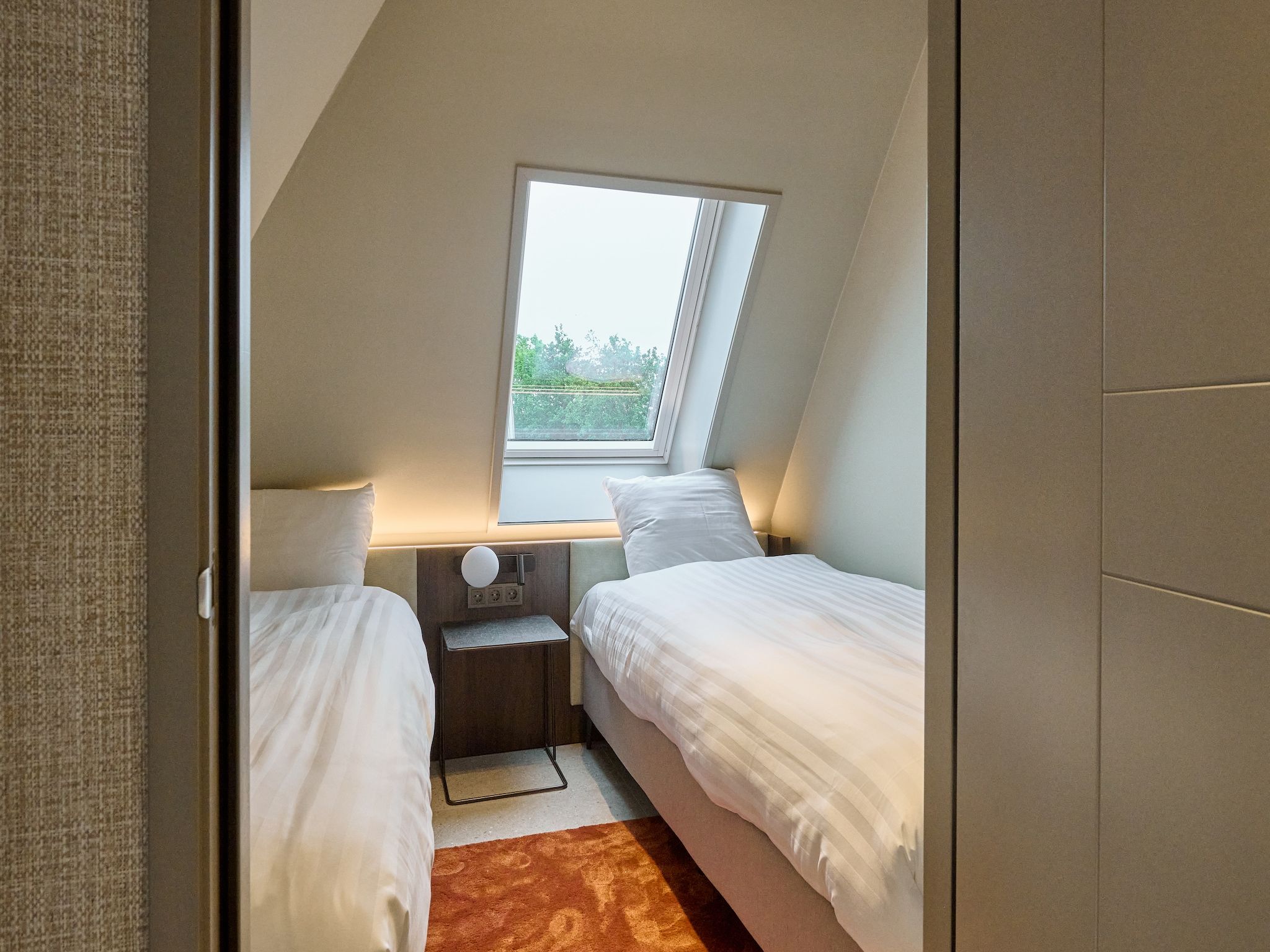 Een slaapkamer van Droomsuites Texel - 6 persoons apartement in Den Burg