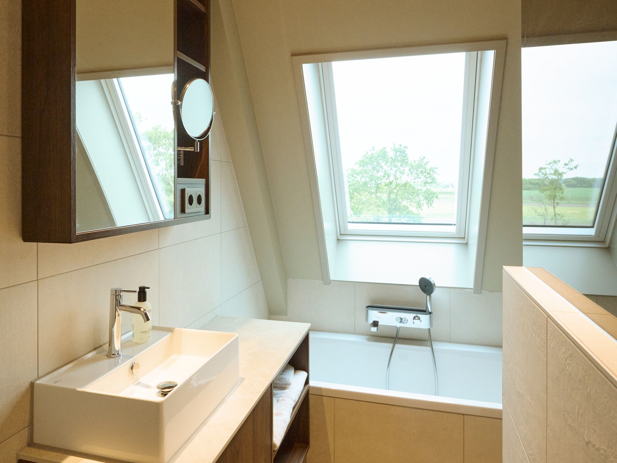 De badkamer van Droomsuites Texel - 6 persoons apartement in Den Burg