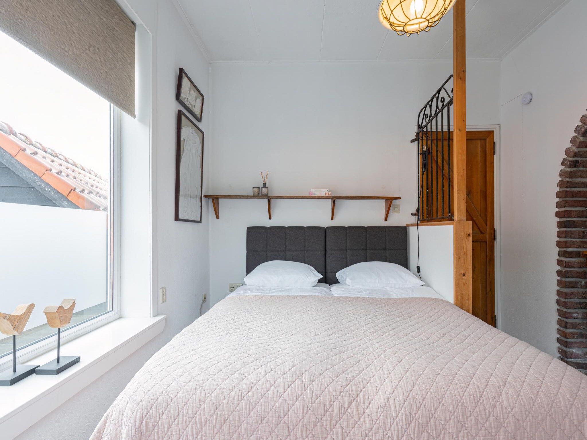 Een slaapkamer van La Chatelaine 1 in Egmond aan Zee