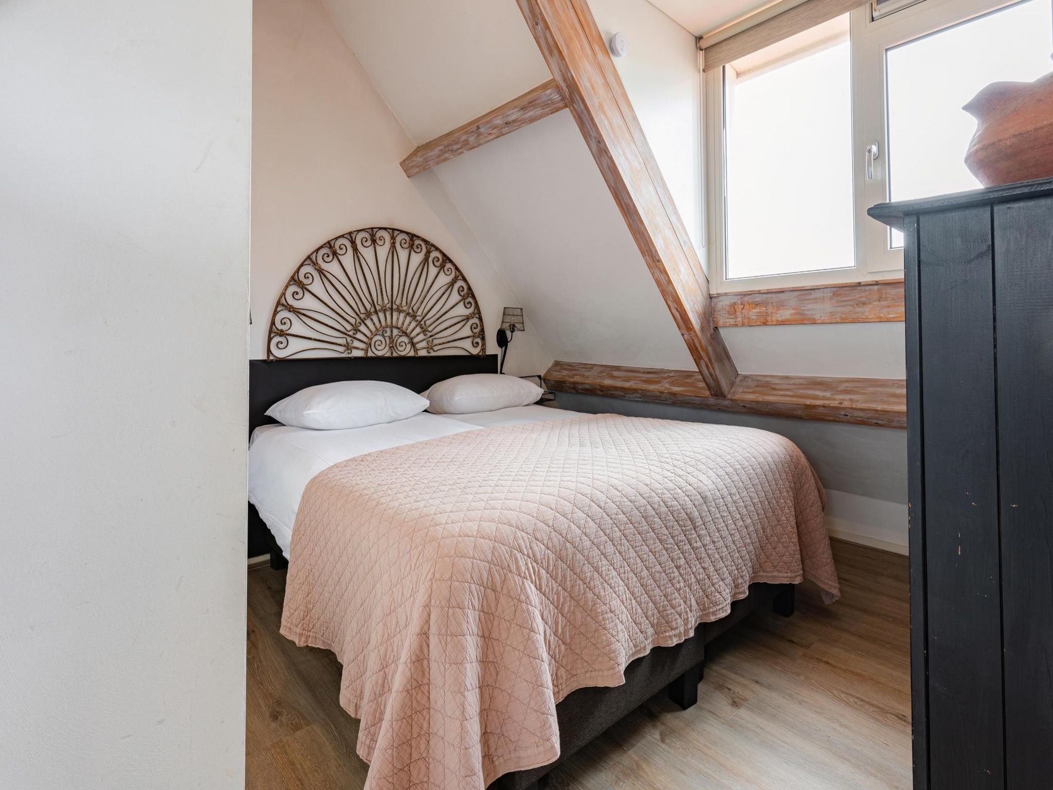 Een slaapkamer van La Chatelaine 2 in Egmond aan Zee