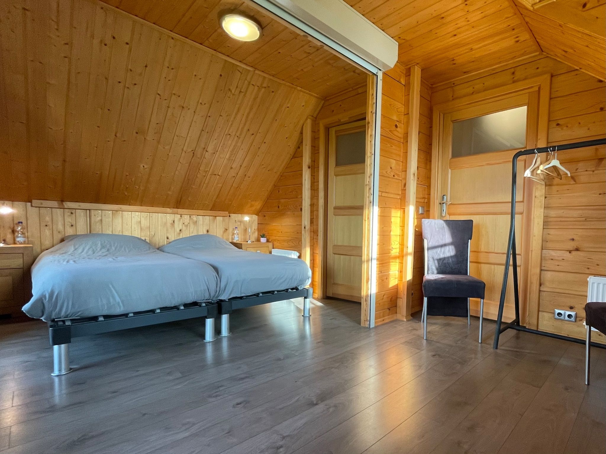 Een slaapkamer van Salland Hideaway - 4 persons in Den Ham