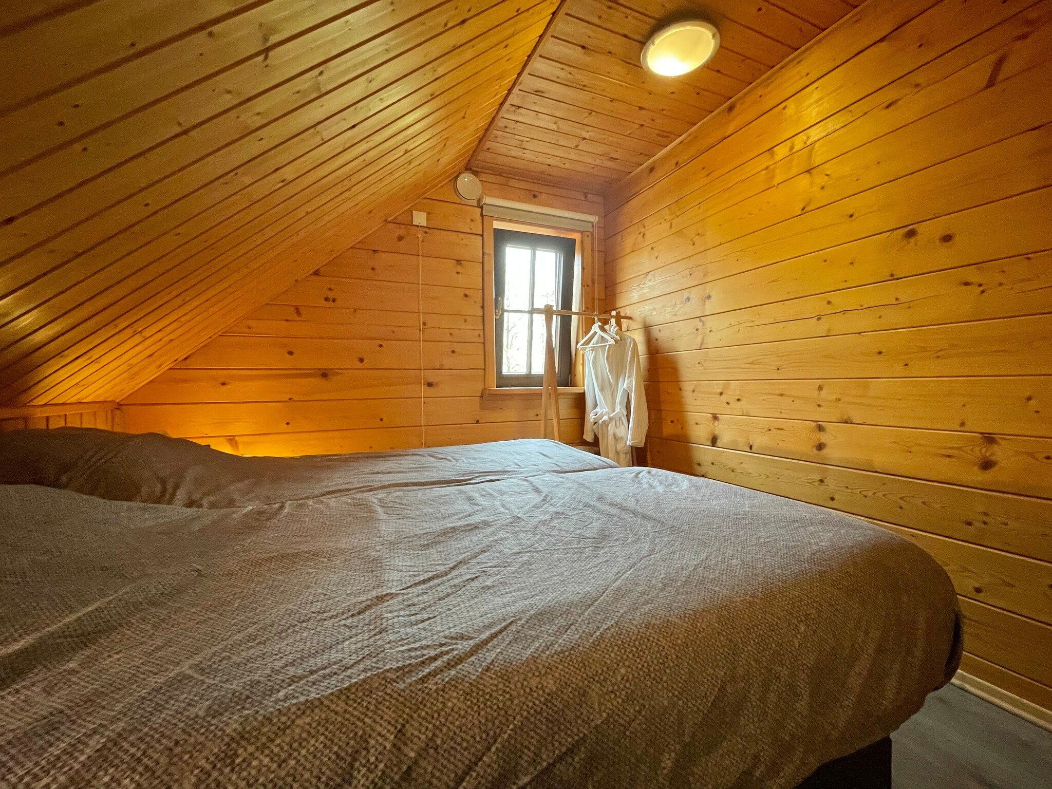 Een slaapkamer van Salland Hideaway - 4 persons in Den Ham