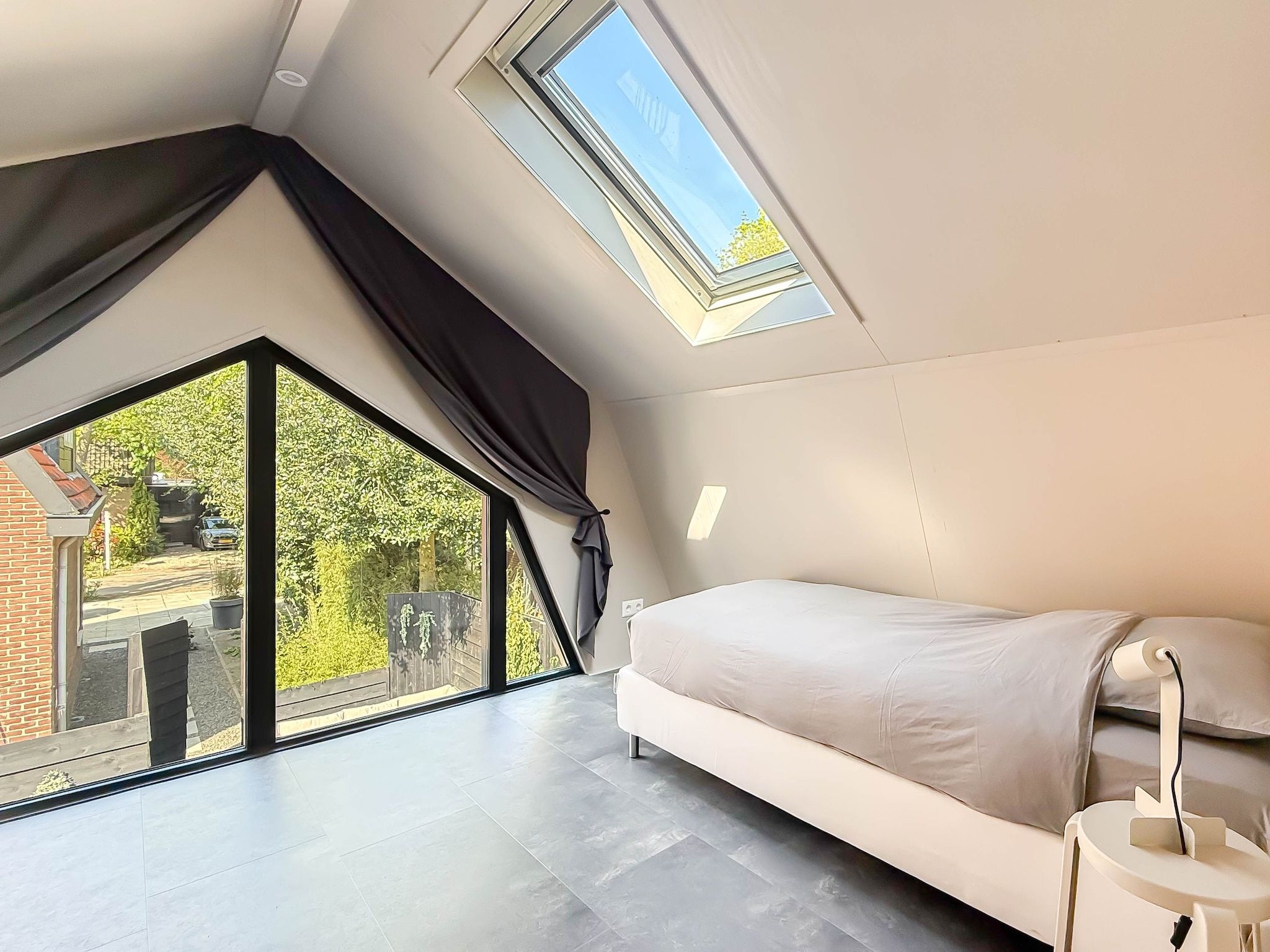 Een slaapkamer van 't Boschhuys in Bergen