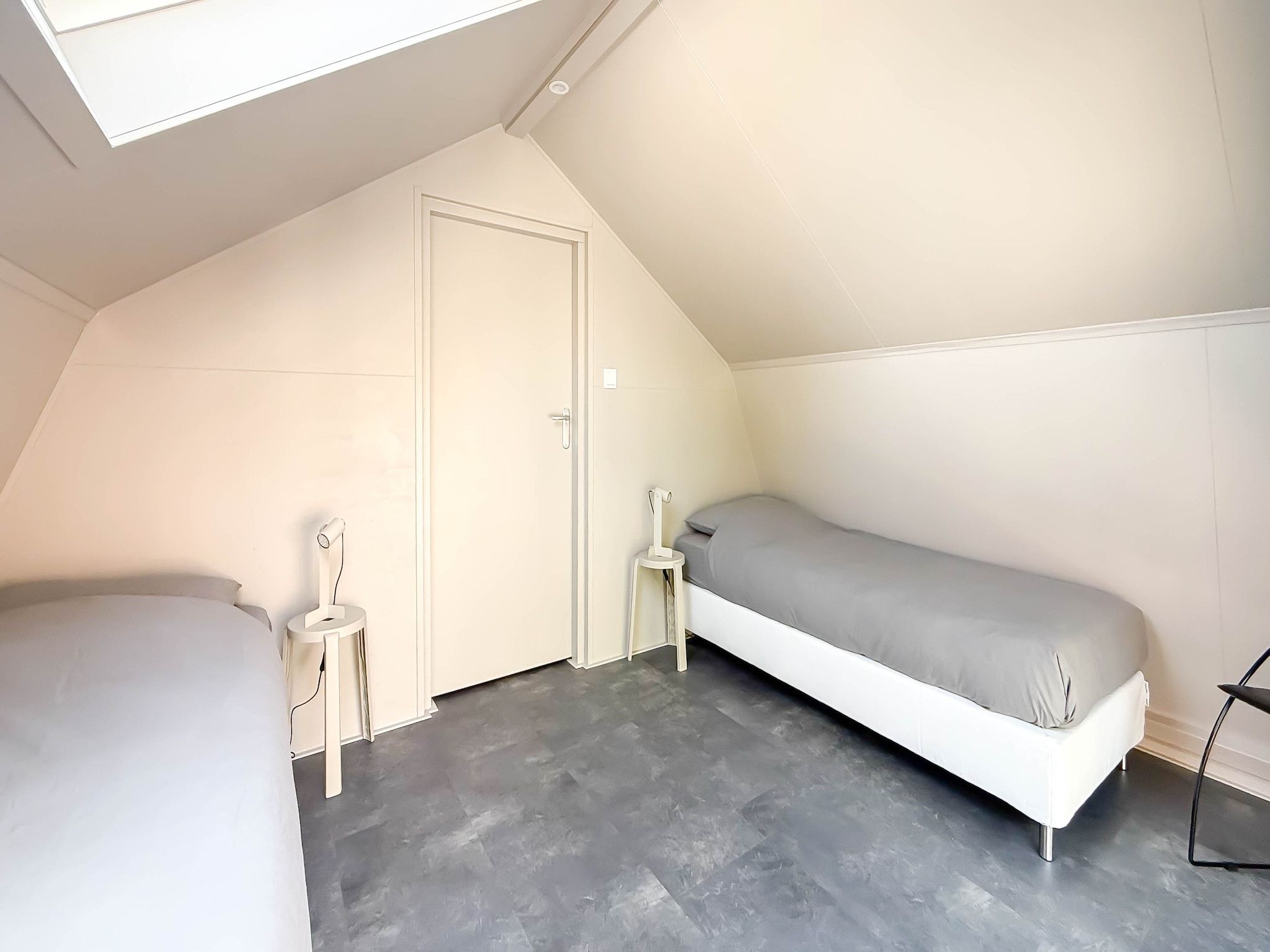 Een slaapkamer van 't Boschhuys in Bergen