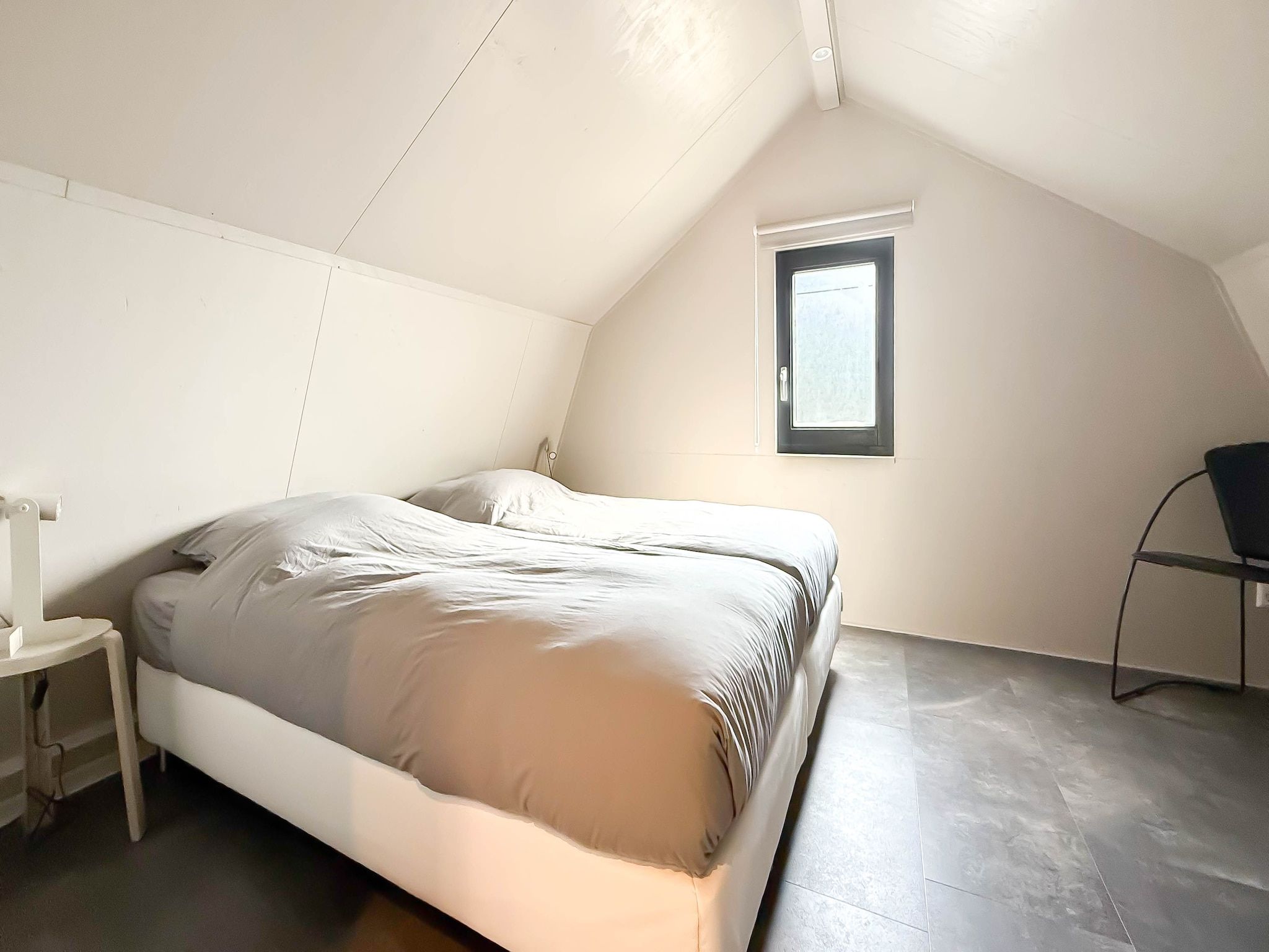 Een slaapkamer van 't Boschhuys in Bergen