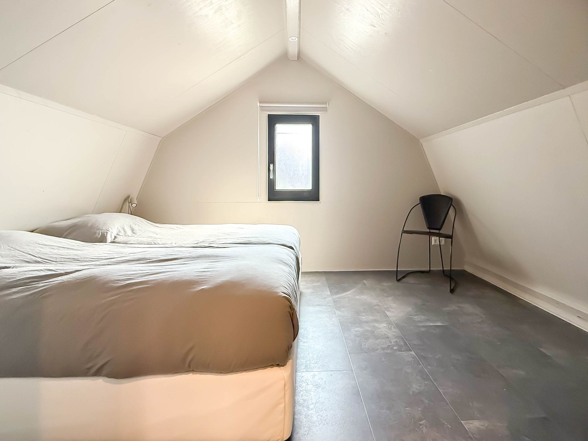 Een slaapkamer van 't Boschhuys in Bergen