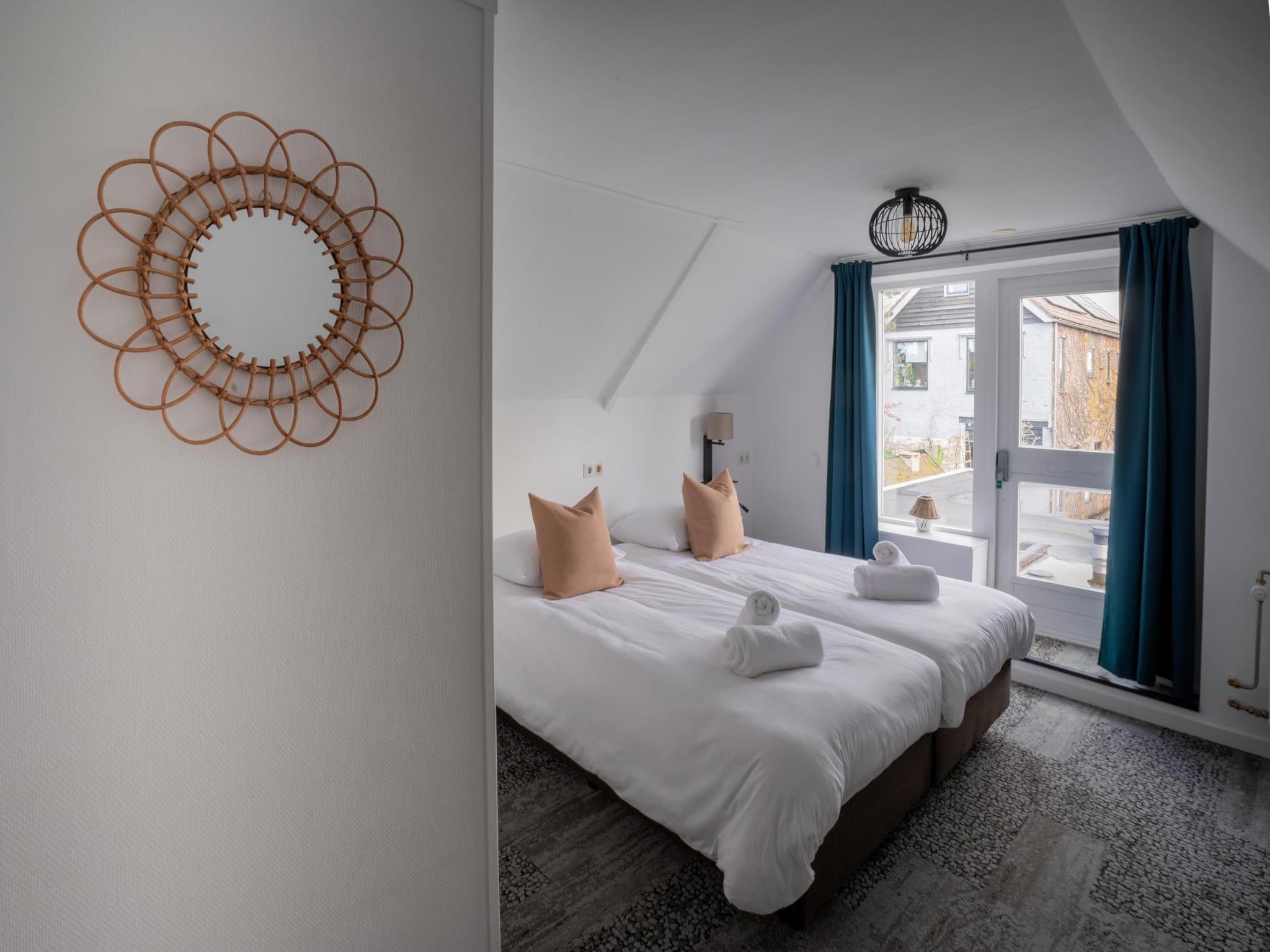 Een slaapkamer van Tussen Duin en Strand in Egmond aan den Hoef