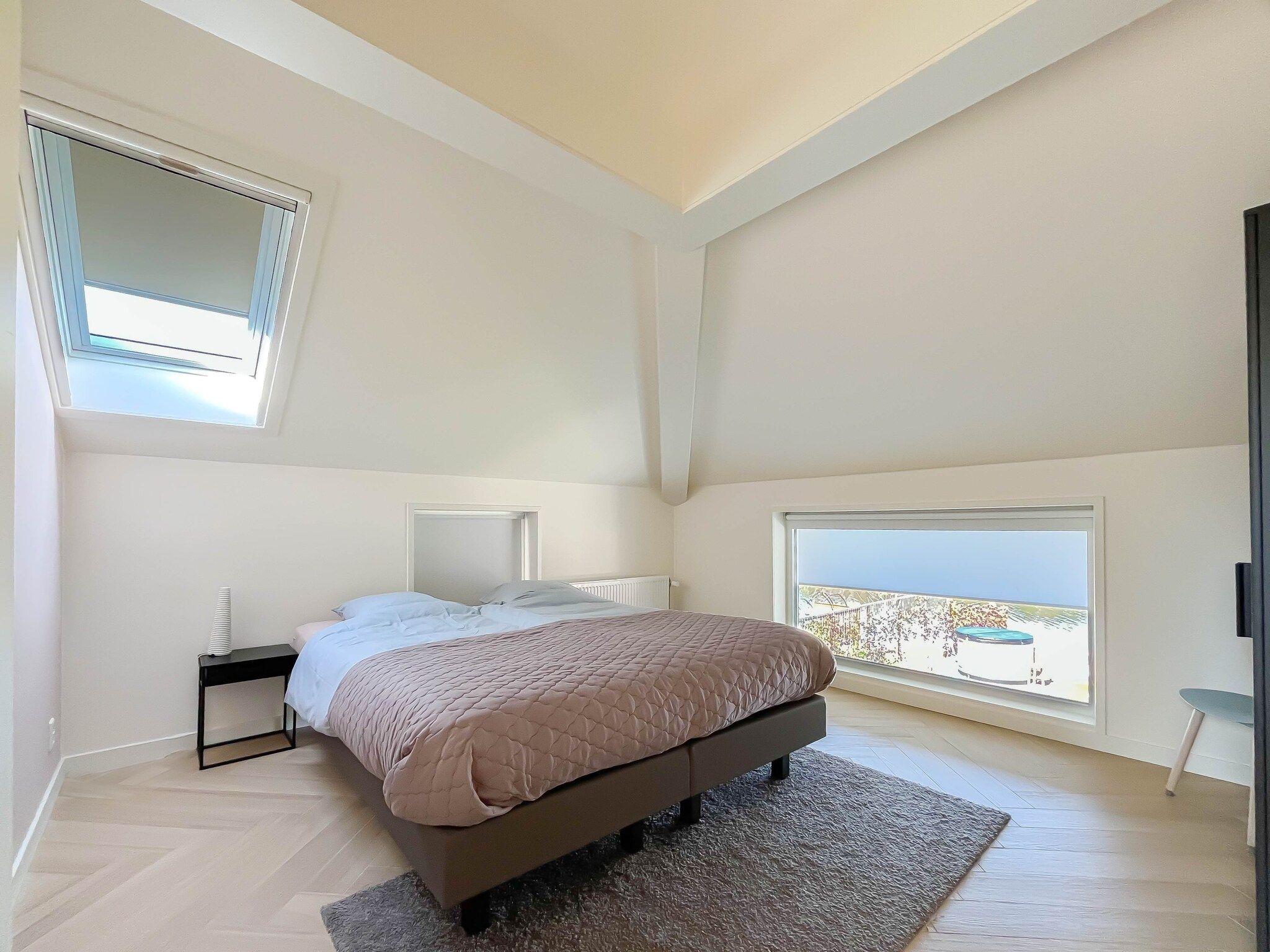 Een slaapkamer van Holiday home Torenvalk in Sibculo