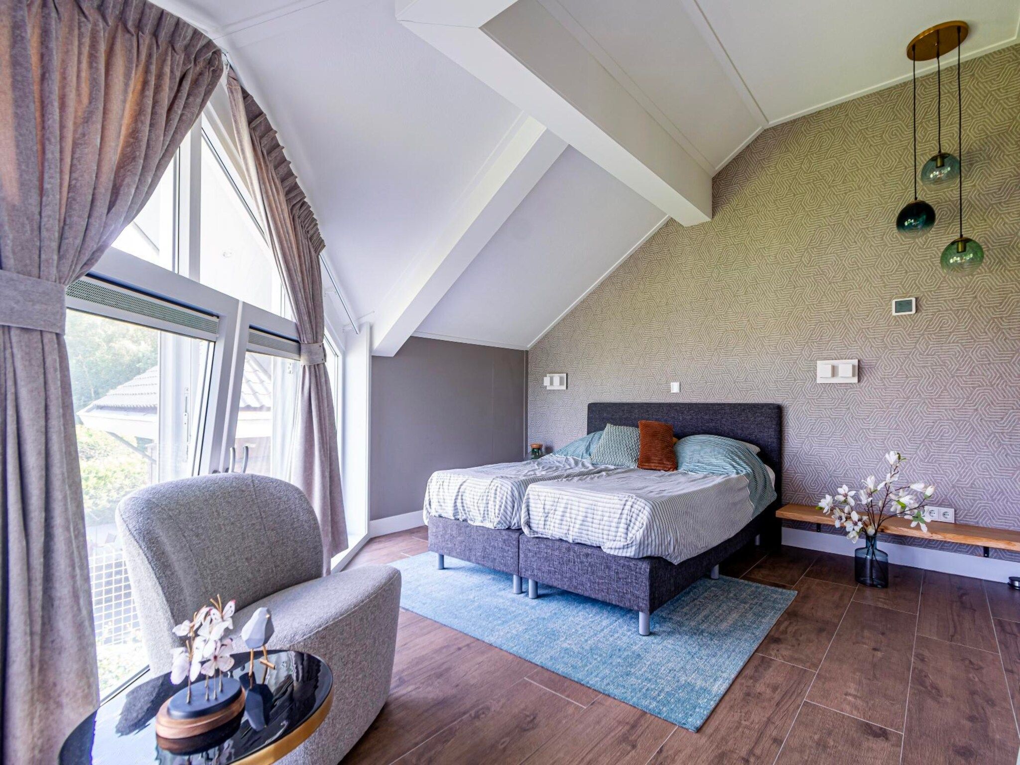 Een slaapkamer van Watervilla Plas van Francke in Sibculo