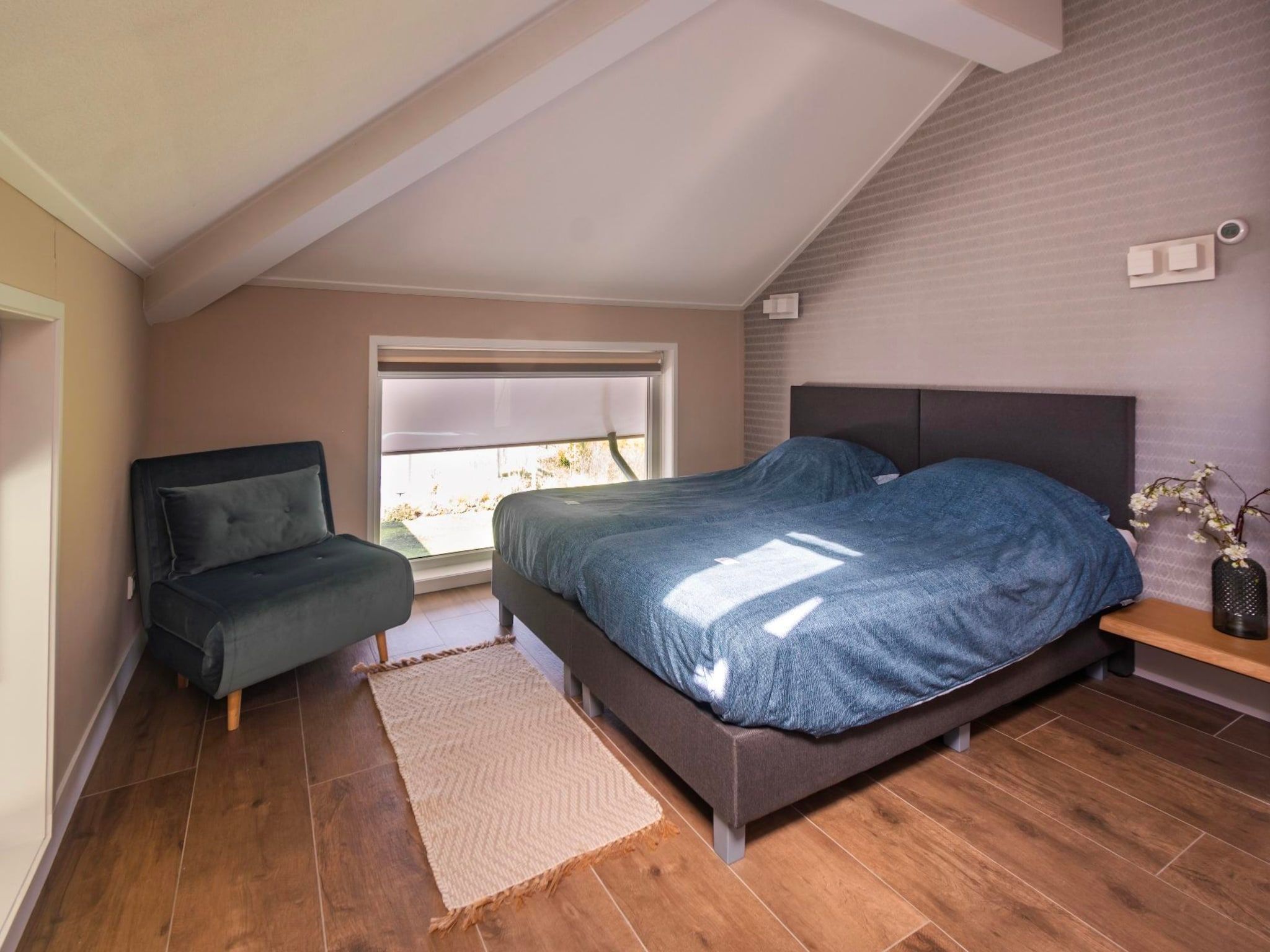 Een slaapkamer van Watervilla Plas van Francke in Sibculo