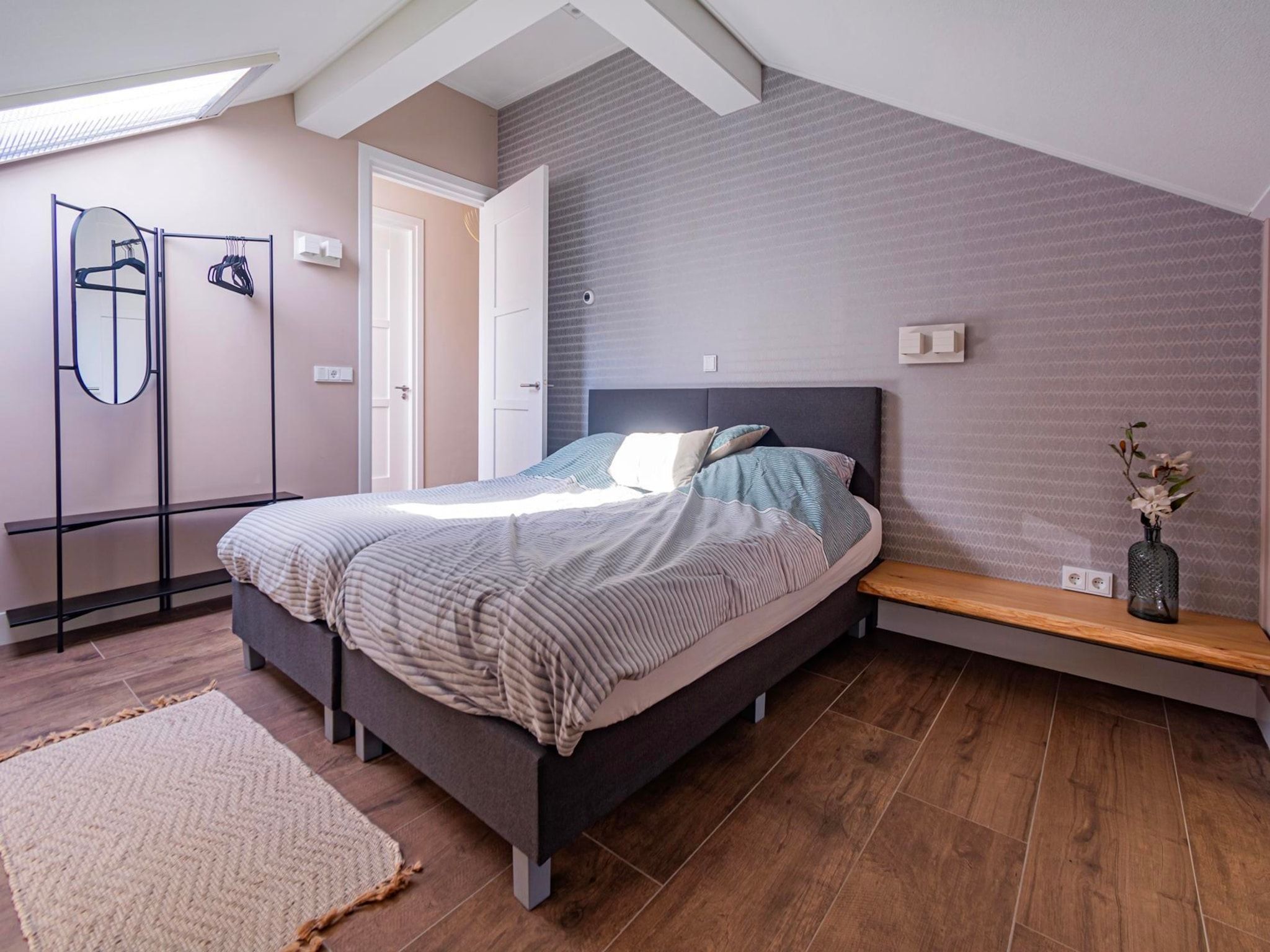 Een slaapkamer van Watervilla Plas van Francke in Sibculo