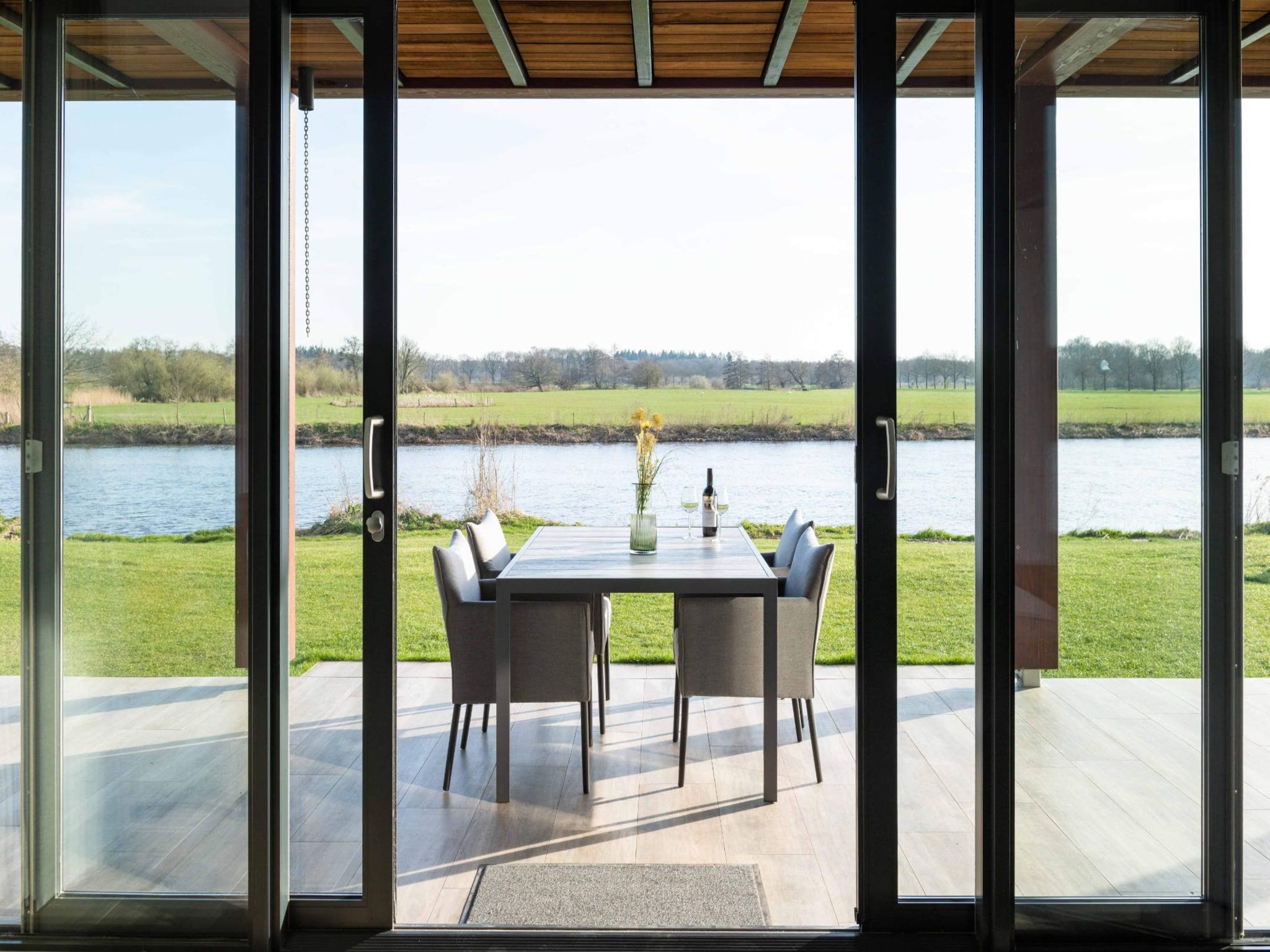 Het terras van Wellness at the Vecht - Ground floor in Dalfsen