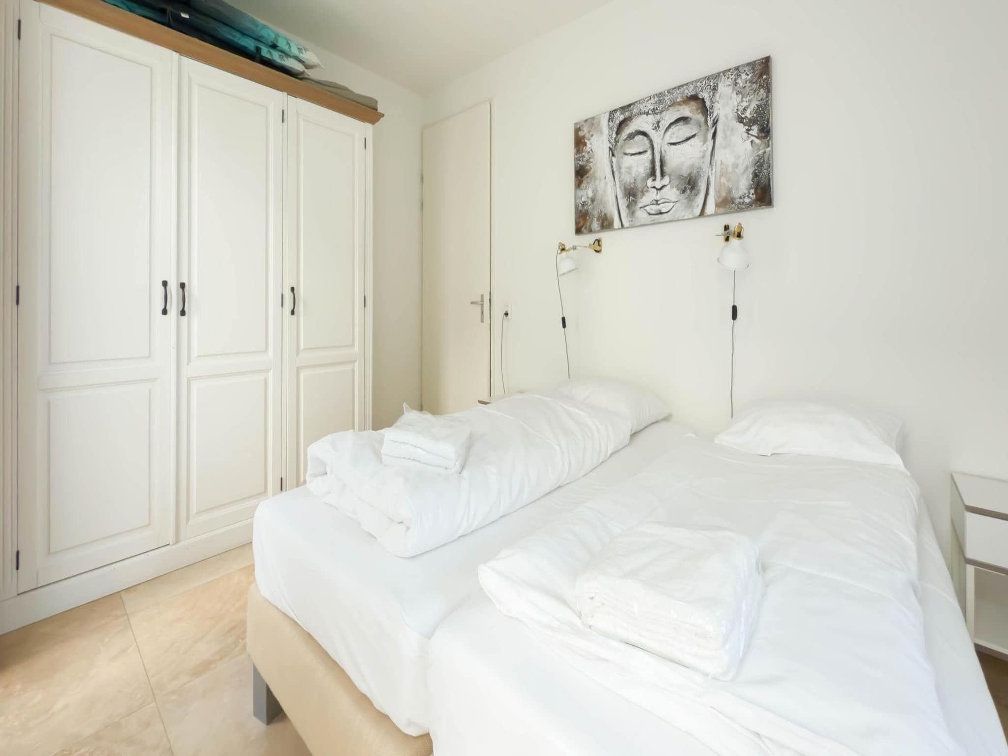 Een slaapkamer van Zilverlicht in Egmond aan Zee