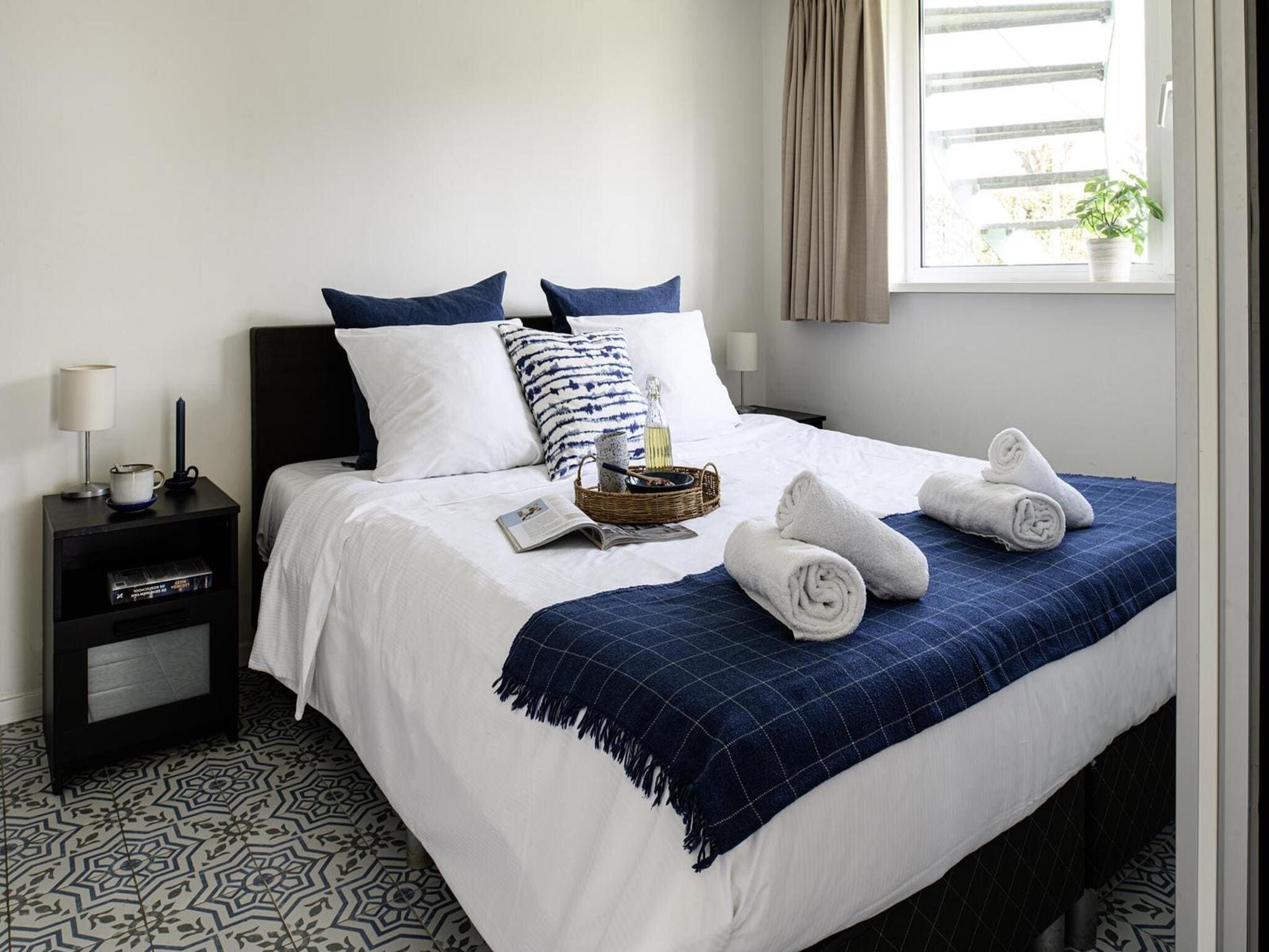 Een slaapkamer van Family House | 10-12 personen | 4 slaapkamers | 3,5 badkamers in Loosdrecht