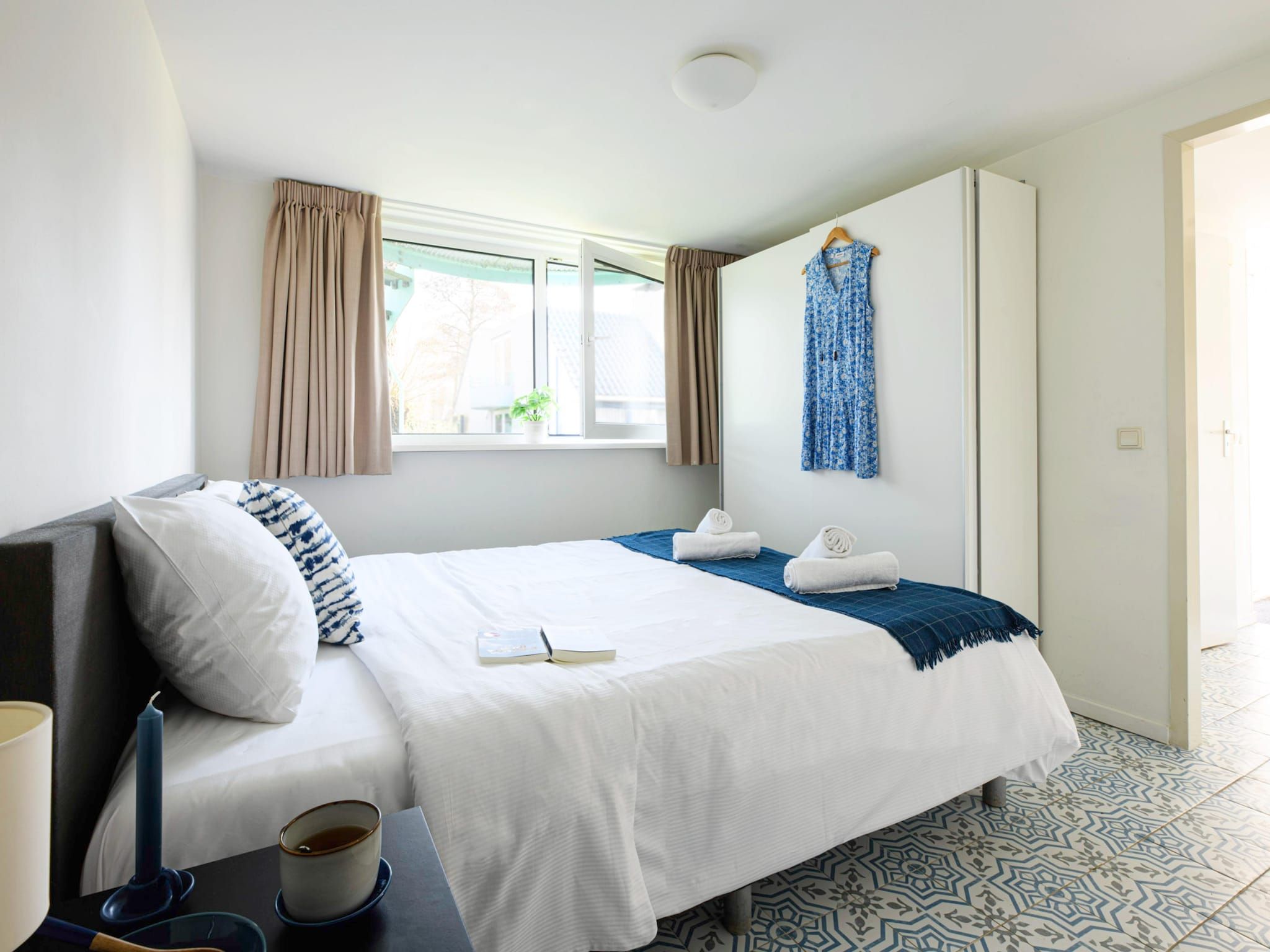 Een slaapkamer van Panorama Villa | 3-8 pers | 3 slaapkamers | 2,5 badkamers in Loosdrecht