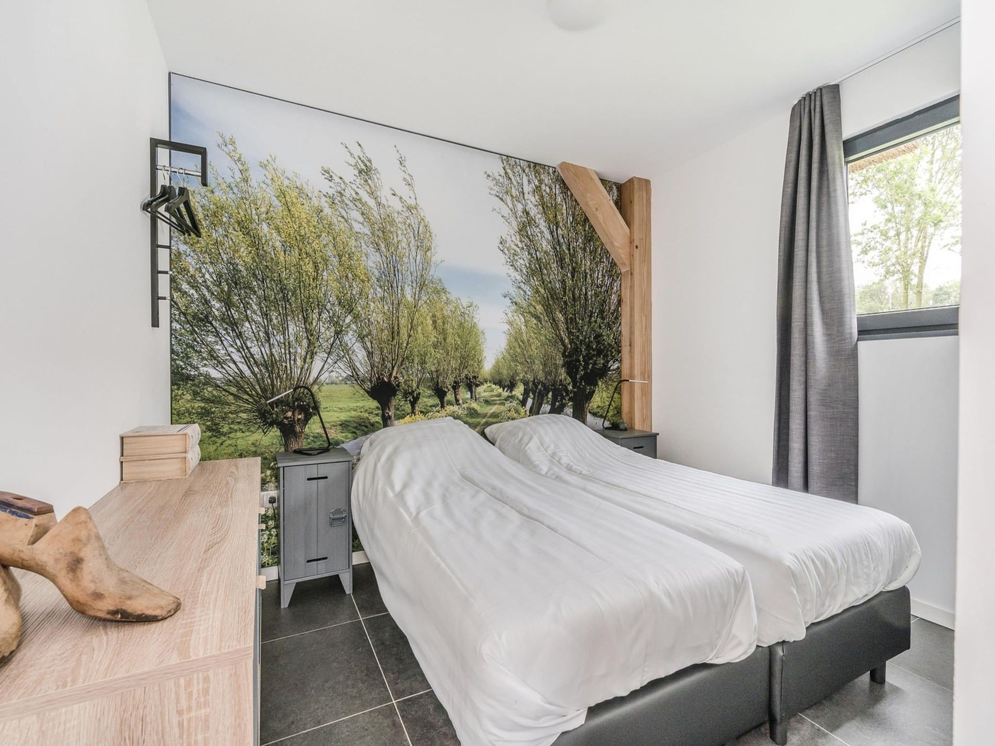 Een slaapkamer van Farm Lodge 676 in Baarle-nassau