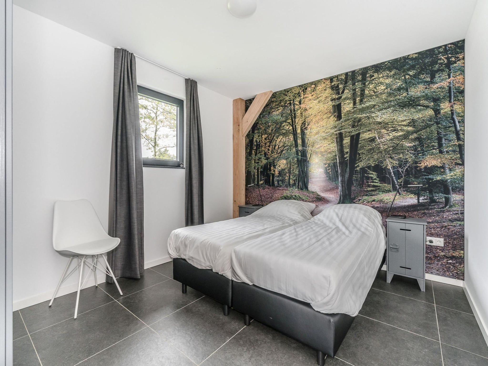 Een slaapkamer van Farm Lodge 676 in Baarle-nassau